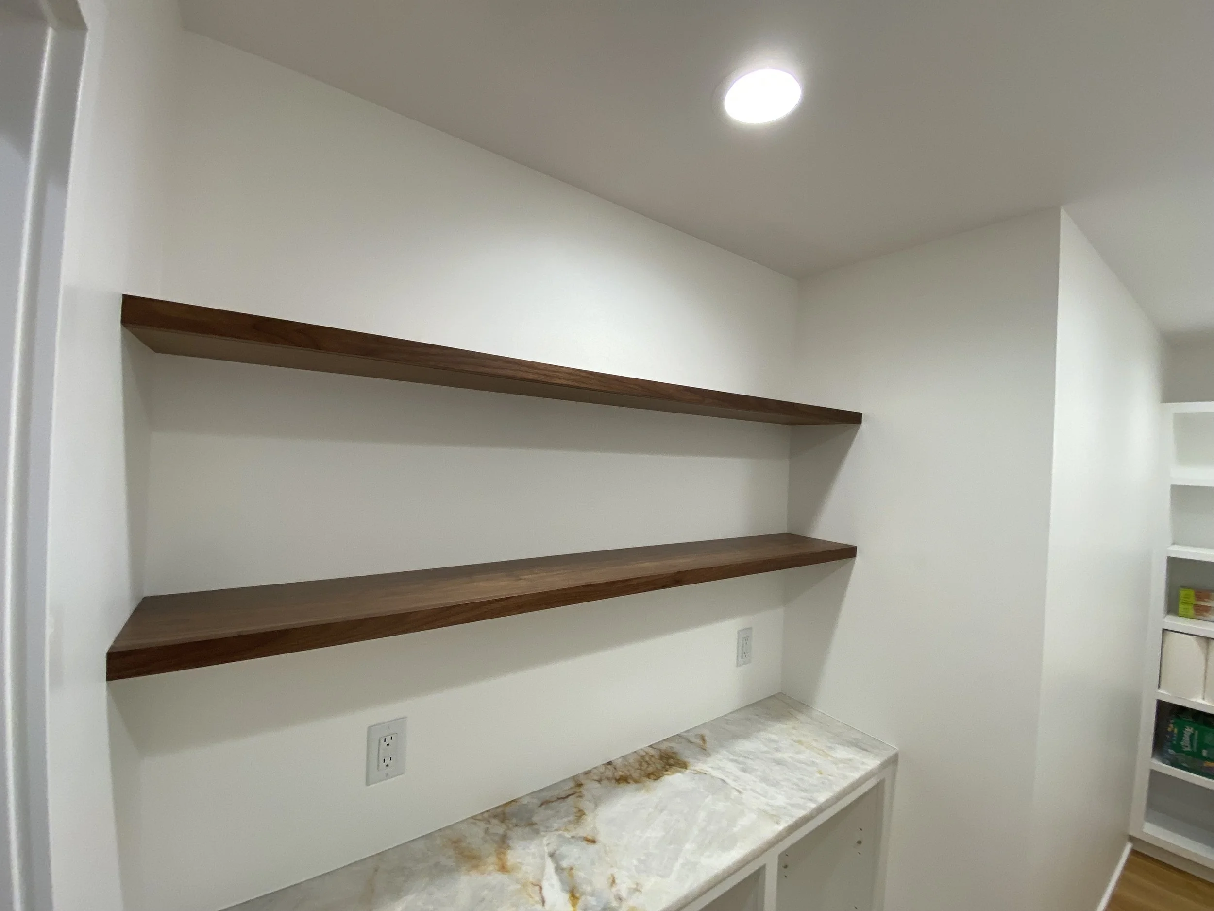 Built in cabinet and floating shelves for Mike Noorman Builders