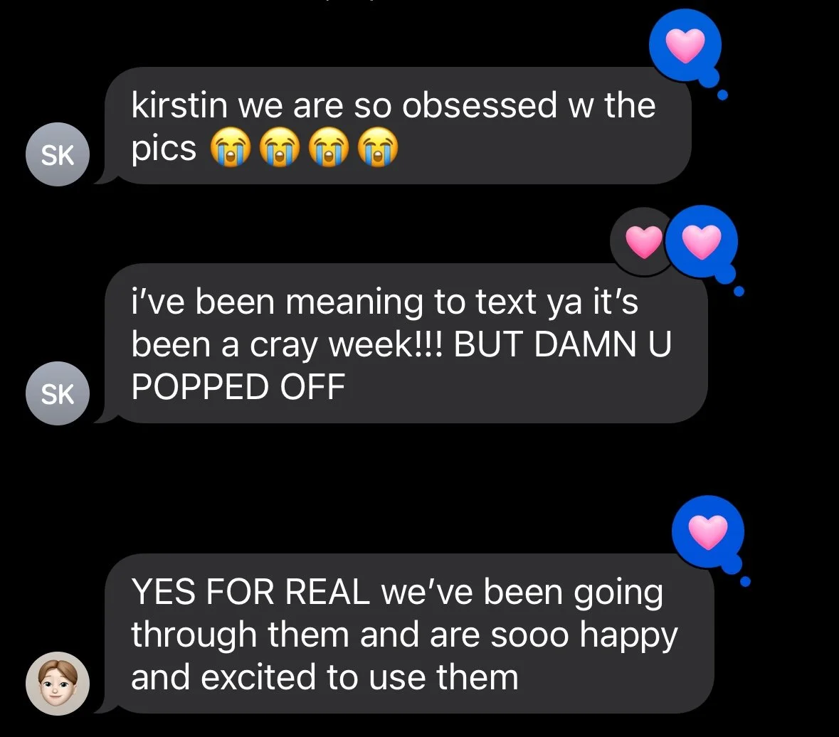 Text message conversation about being obsessed with pictures and feeling emotional about them, with pink and blue heart emojis.
