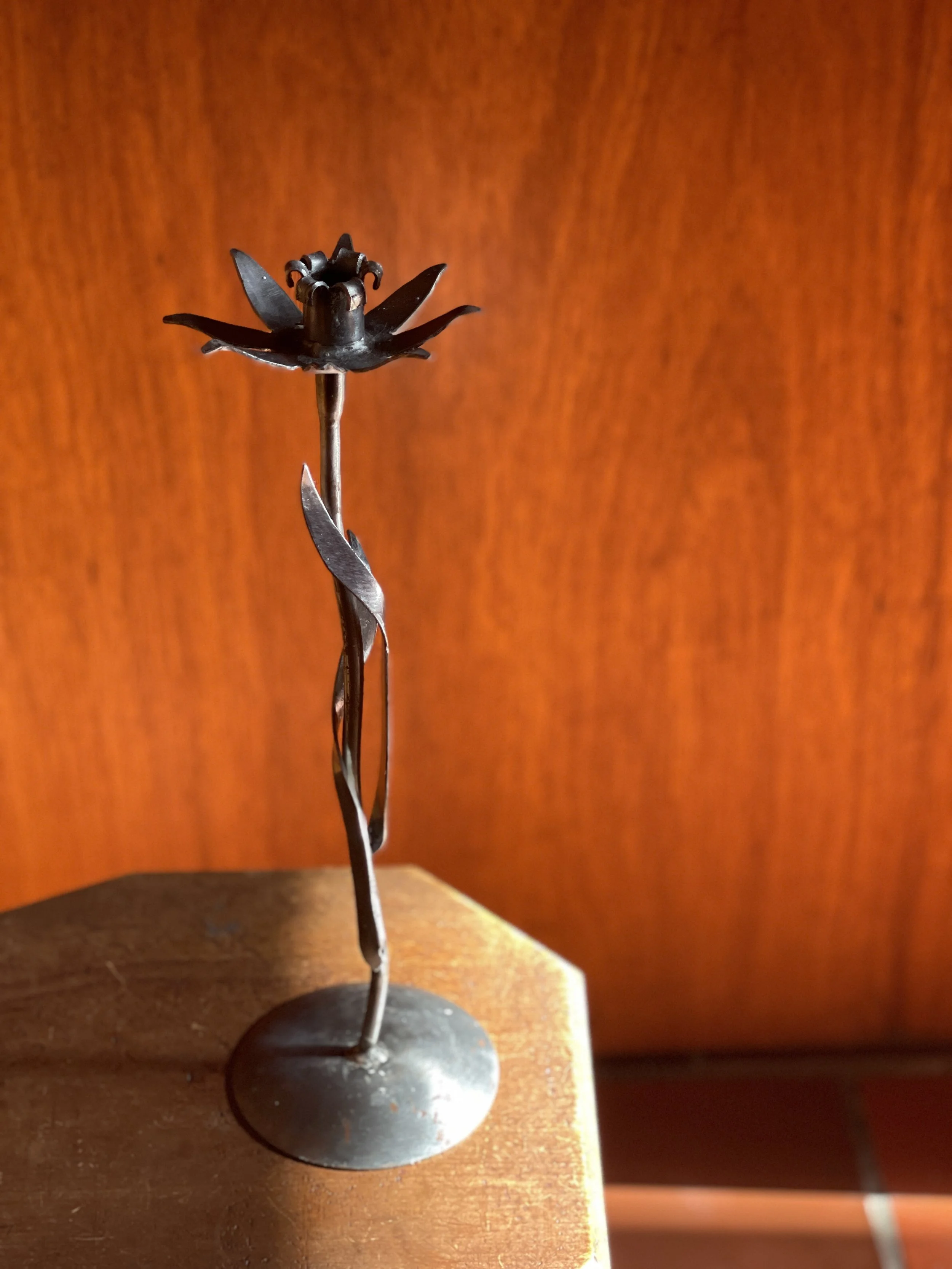 metal flower candle holder.