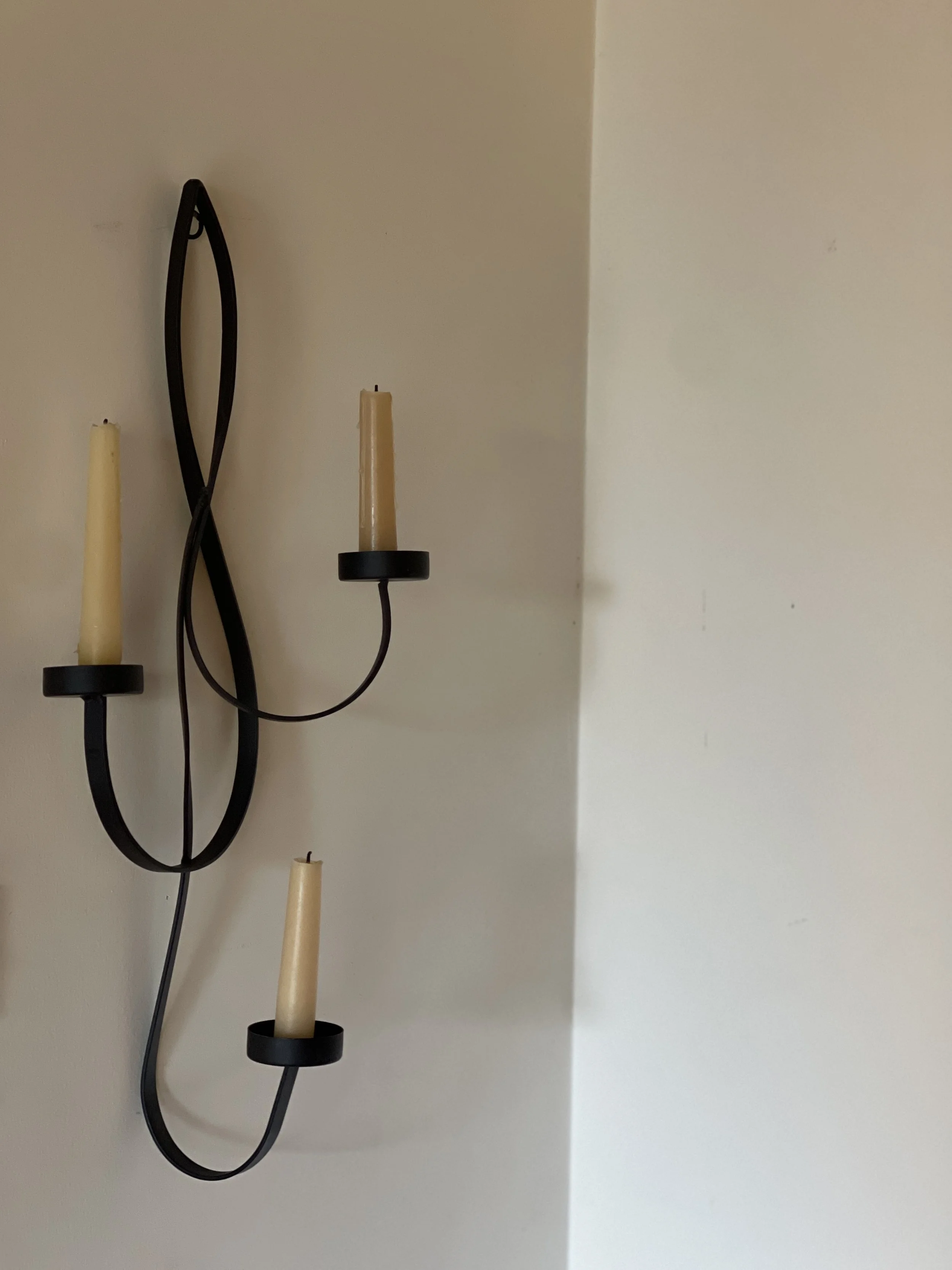curvy iron wall candle sconce