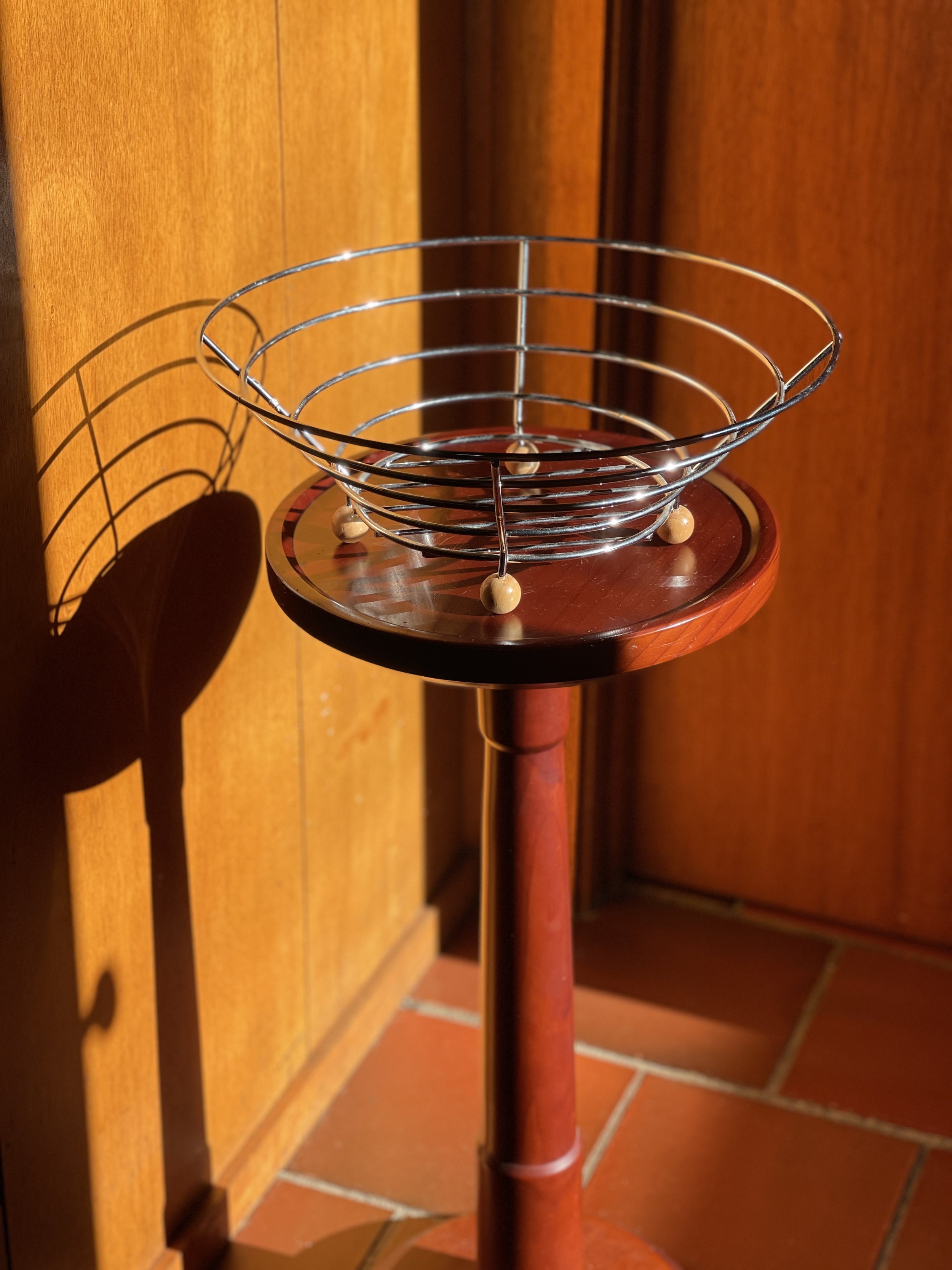 wire bowl on timber ball feet
