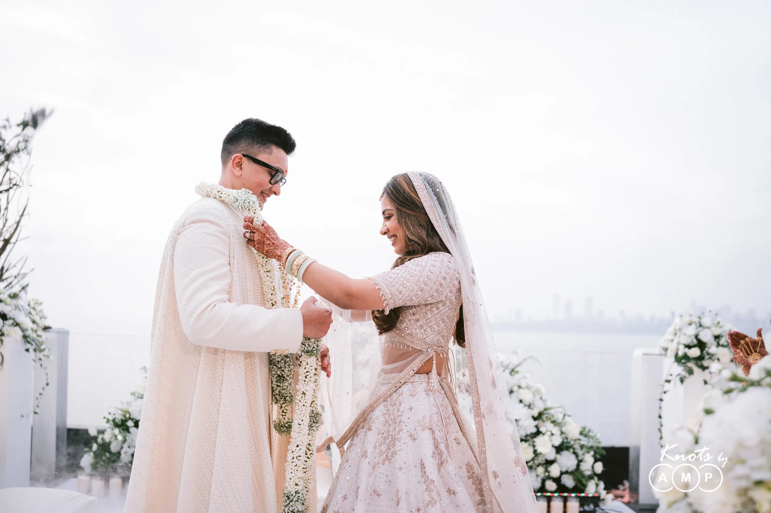 Thirteen years in the making, one sunset to remember - Anusha and Varun’s wedding.