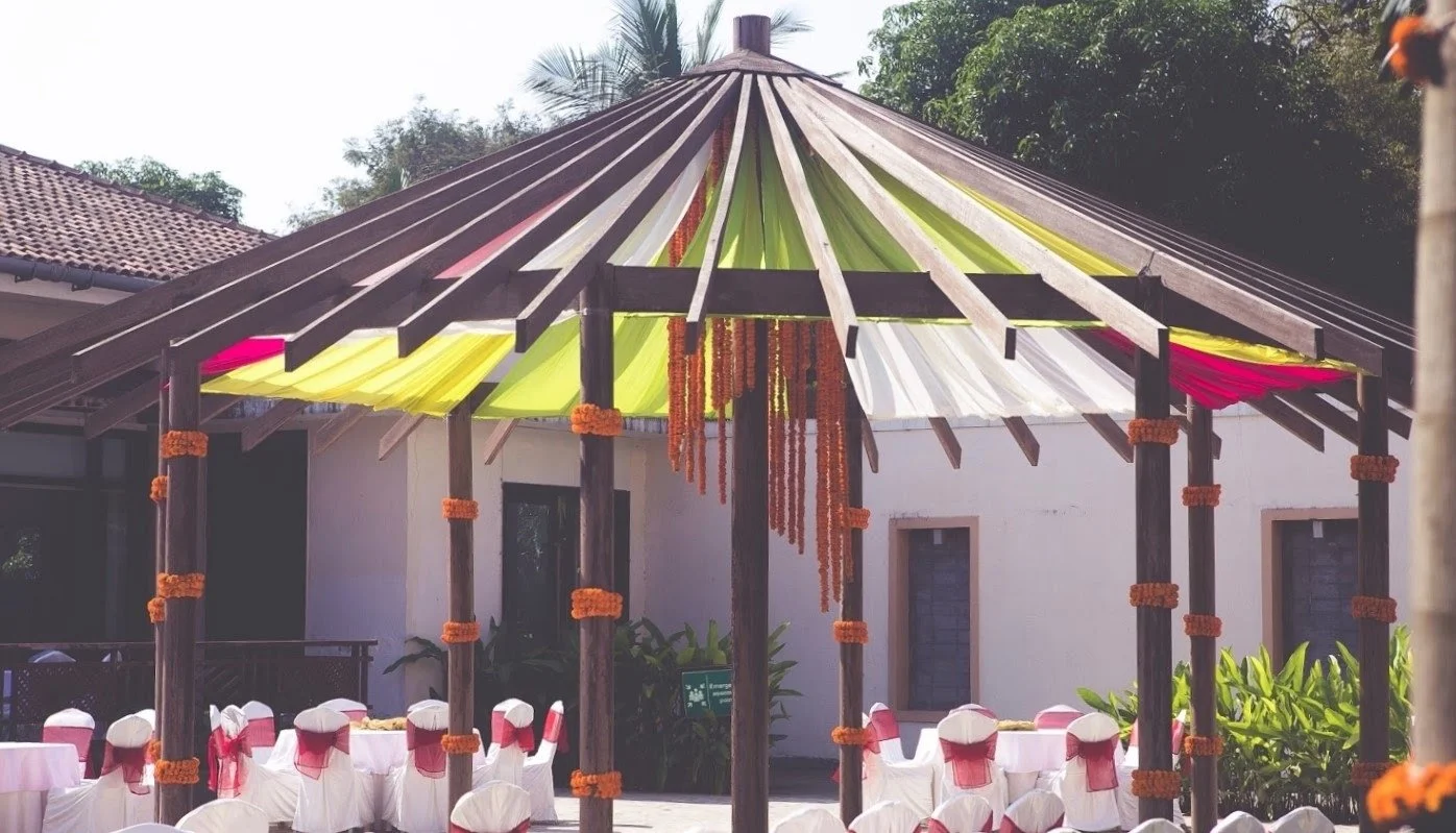 Colourful haldi canopy by the cottage at Radisson Blu Alibaug
