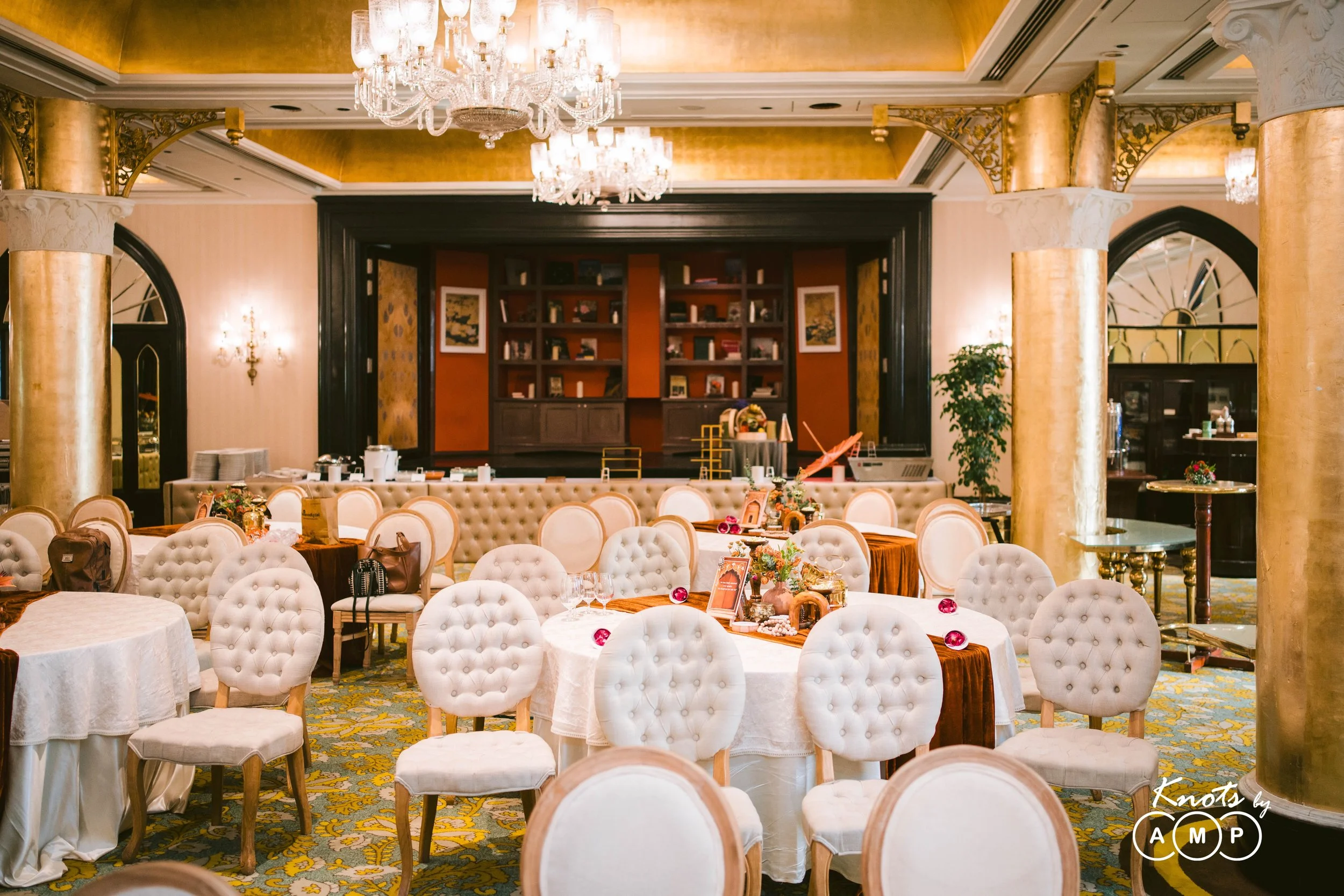 Banquet hall with chandeliers set for a wedding at The Taj Mahal Palace Mumbai