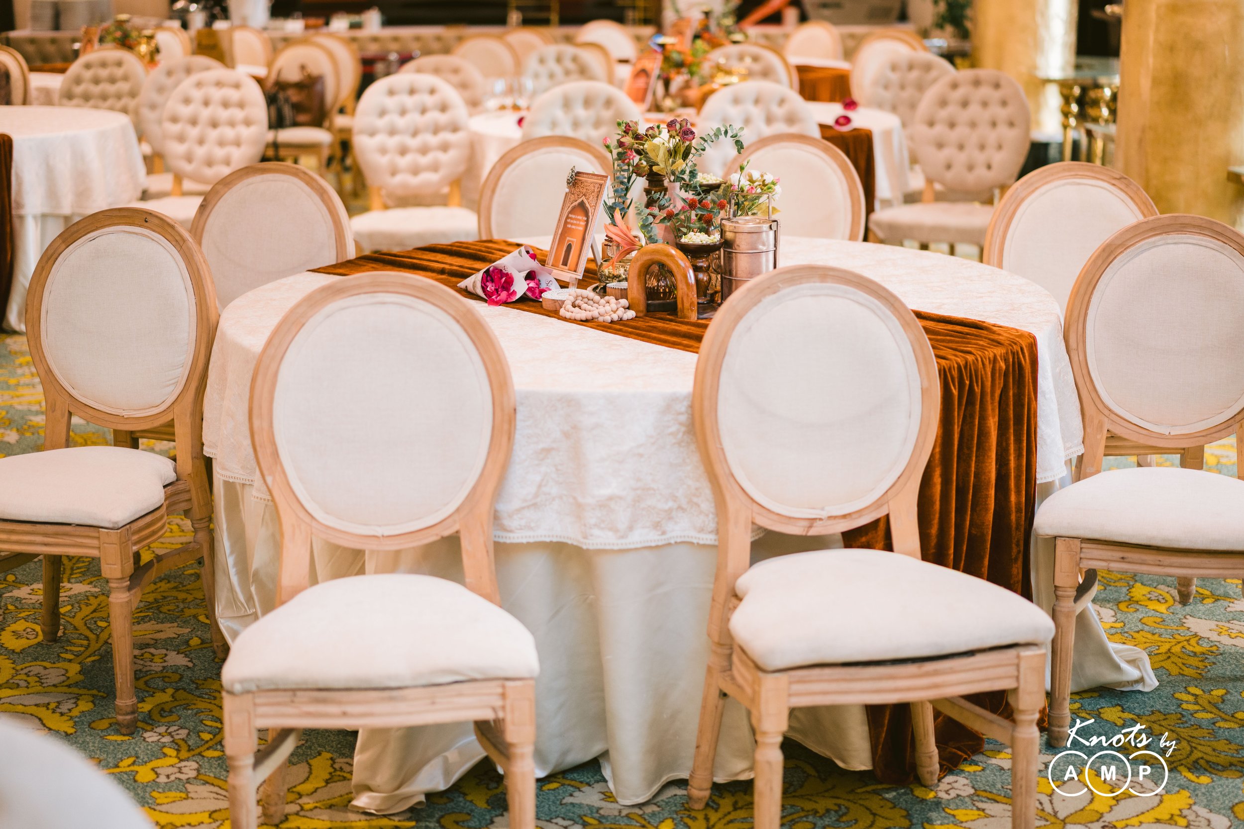 Close-up of wedding tables with velvet runners at The Taj Mahal Palace