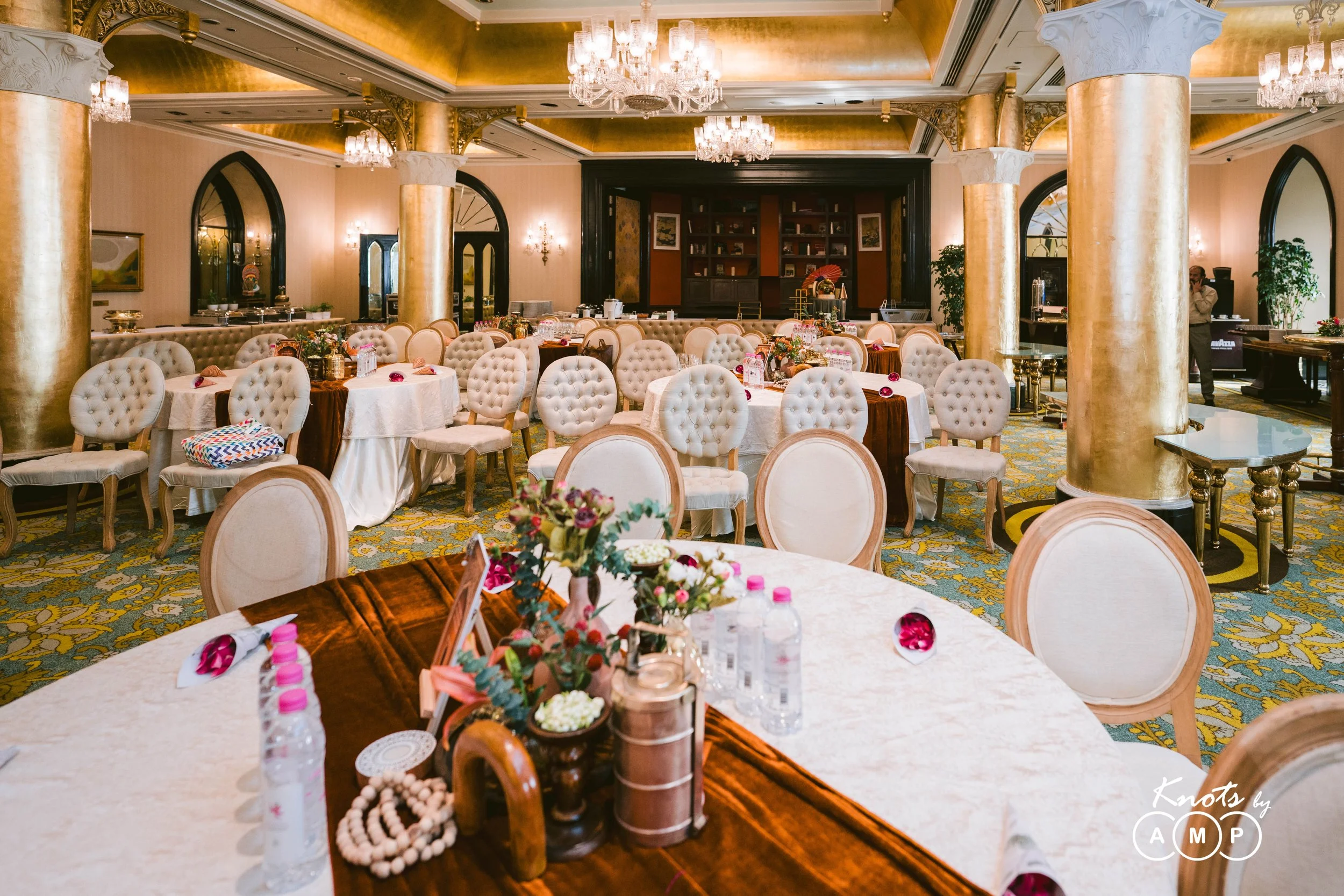 Reception tables set under pillars at The Taj Mahal Palace