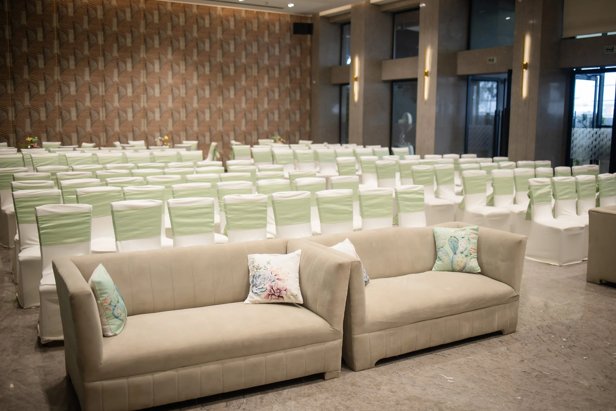 Sofas and theatre seating in a hall at Blue Sea Banquets