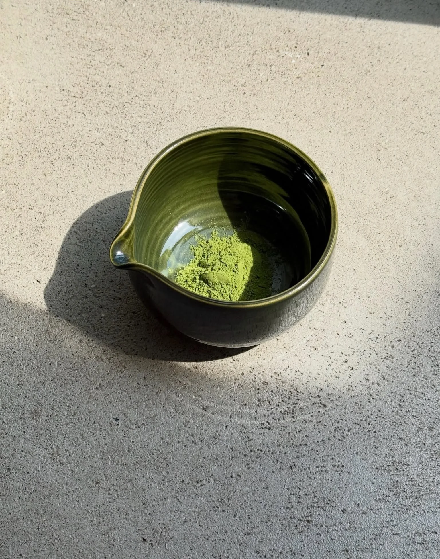 The kind of green we never get tired of.

Handcrafted ceramic set featuring a matcha bowl &amp; whisk holder.
Minimal, timeless, made to last - an everyday ritual piece by &eacute;go&iuml;ste.