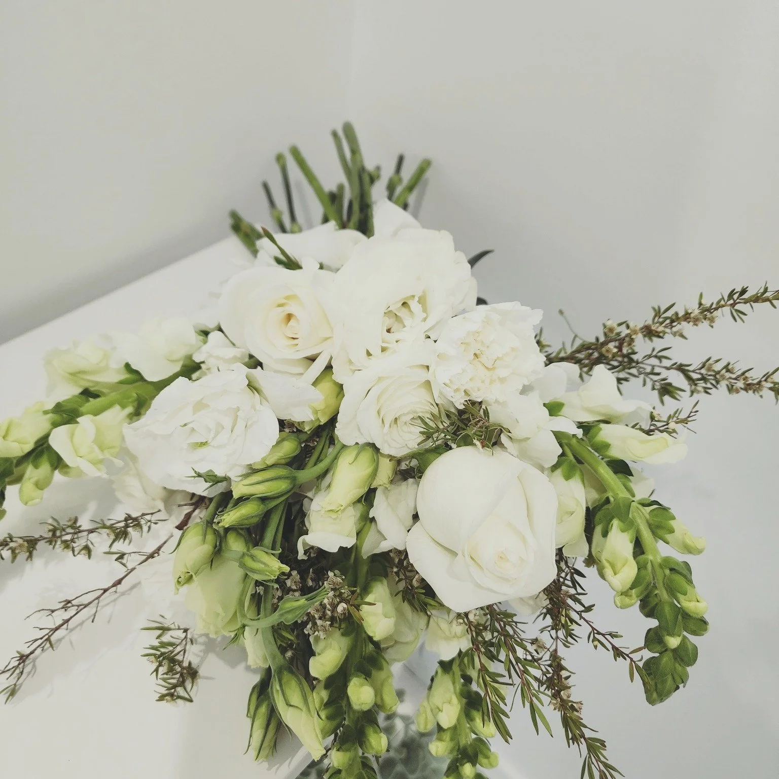 A florist doesn't just take one picture of her bouquet, she takes many (sometimes 20, sometimes a 100 lol)

My camera roll is full of photo's of the same arrangements, different locations, different lighting, different angles.

Elopement bouquet in c