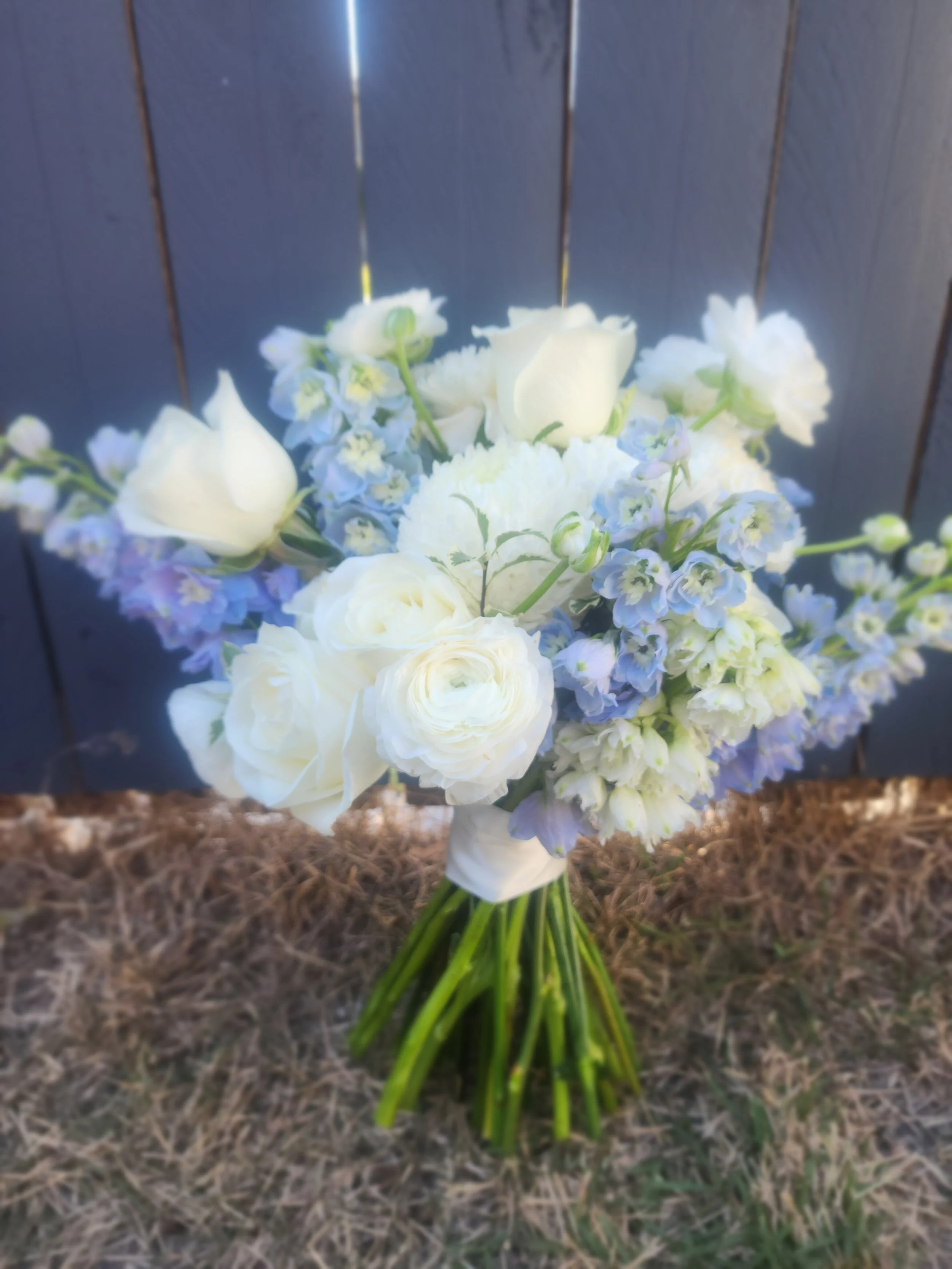 White_and_blue_wedding_bouquet.jpg