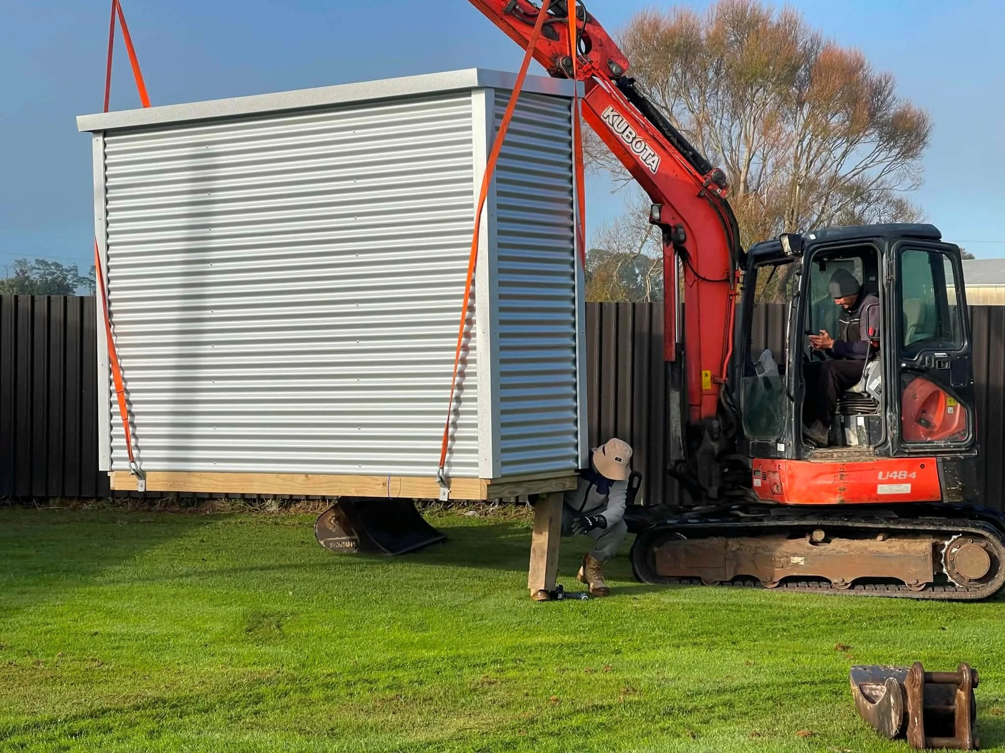Shed moving onto site.jpg