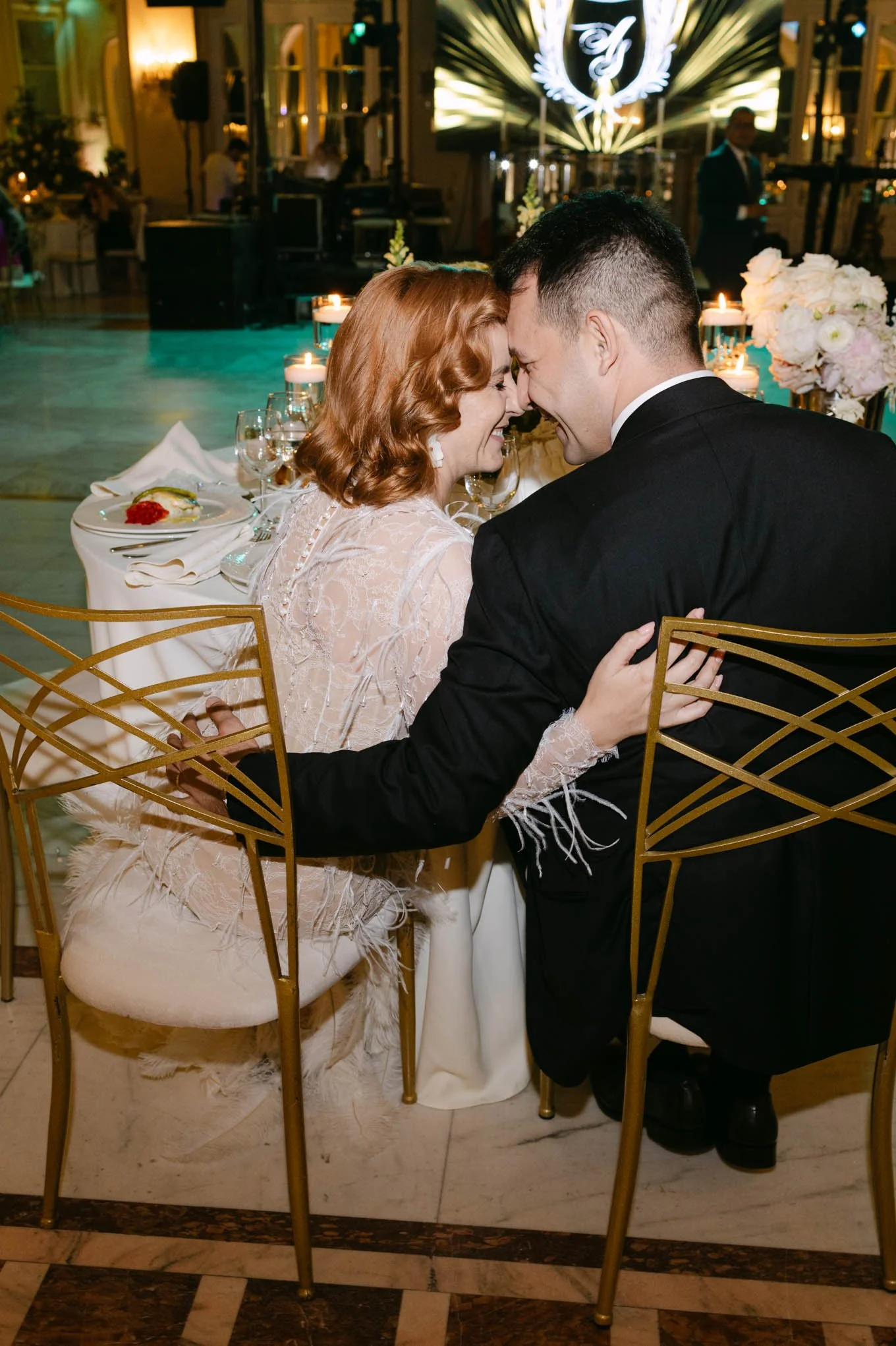 A couple at their wedding!1 Fashion photo with them almost kissing! As seen in Vogue.