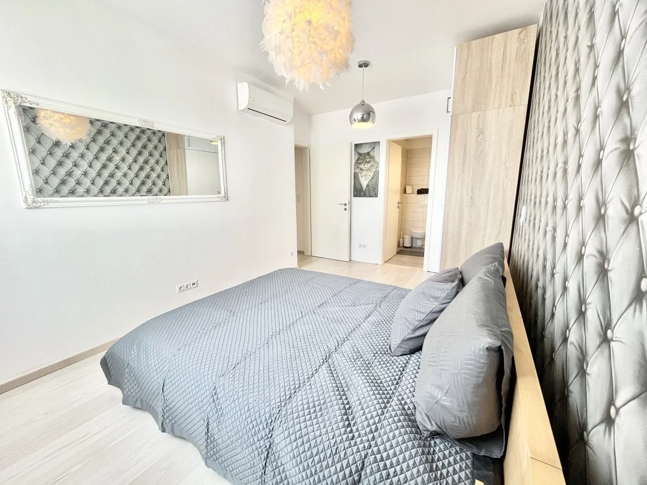 Bed and Bathroom with Closet