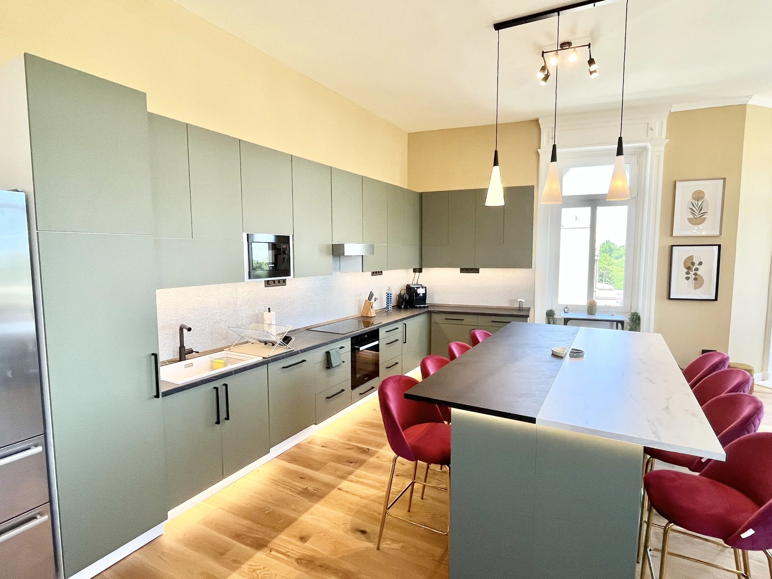 Modern kitchen with built-in oven and induction cooktop