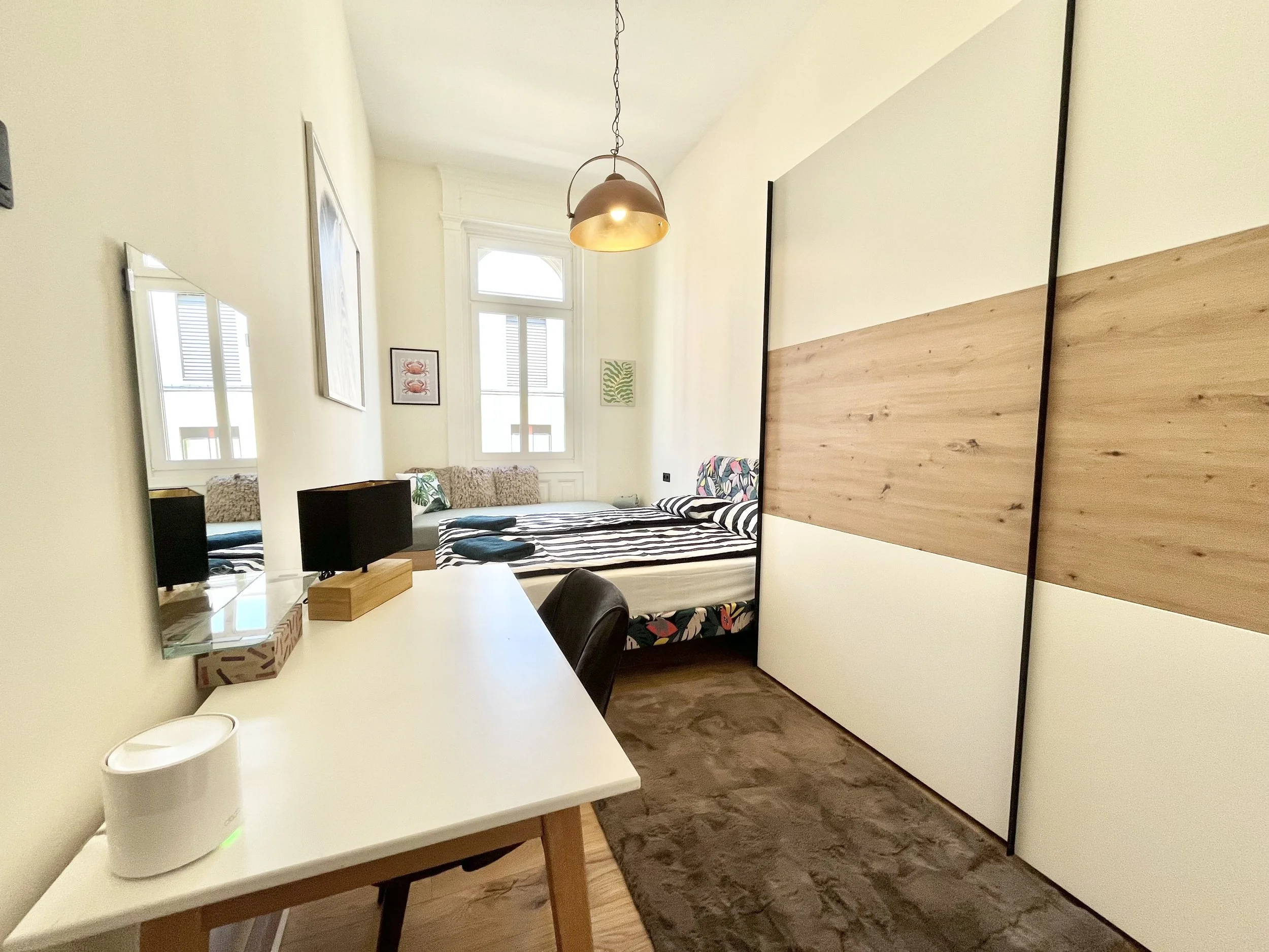 Bedroom with desk and closet
