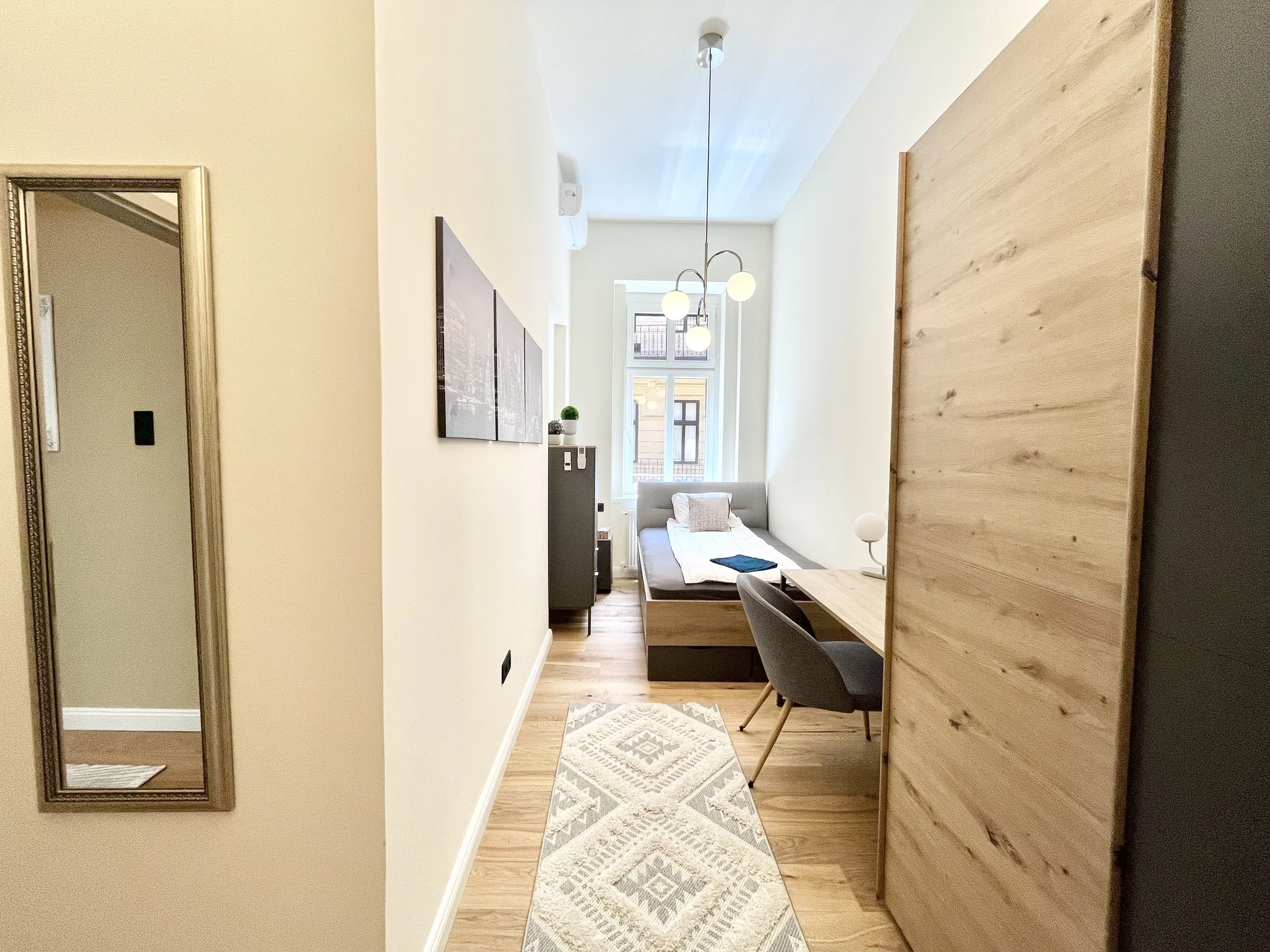 Bedroom With Single Bed and Closet