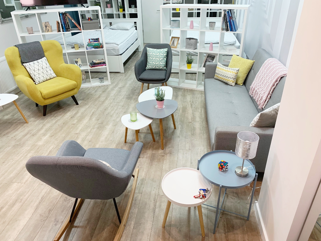 common area with armchairs and sofa