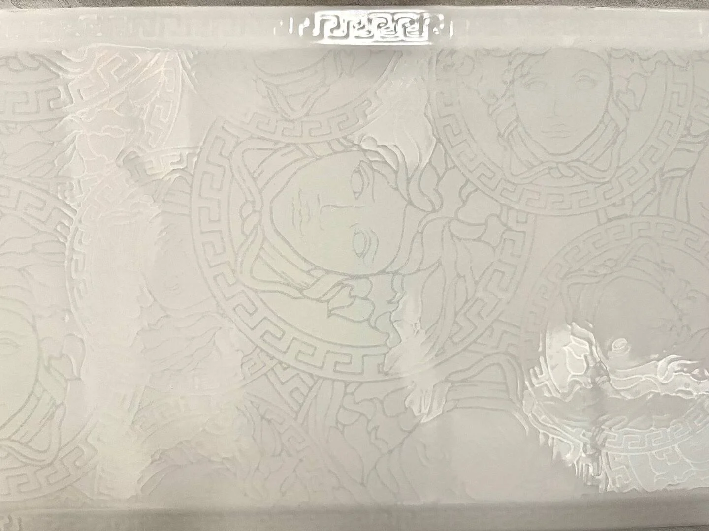 Versace Tiles Throughout.jpeg