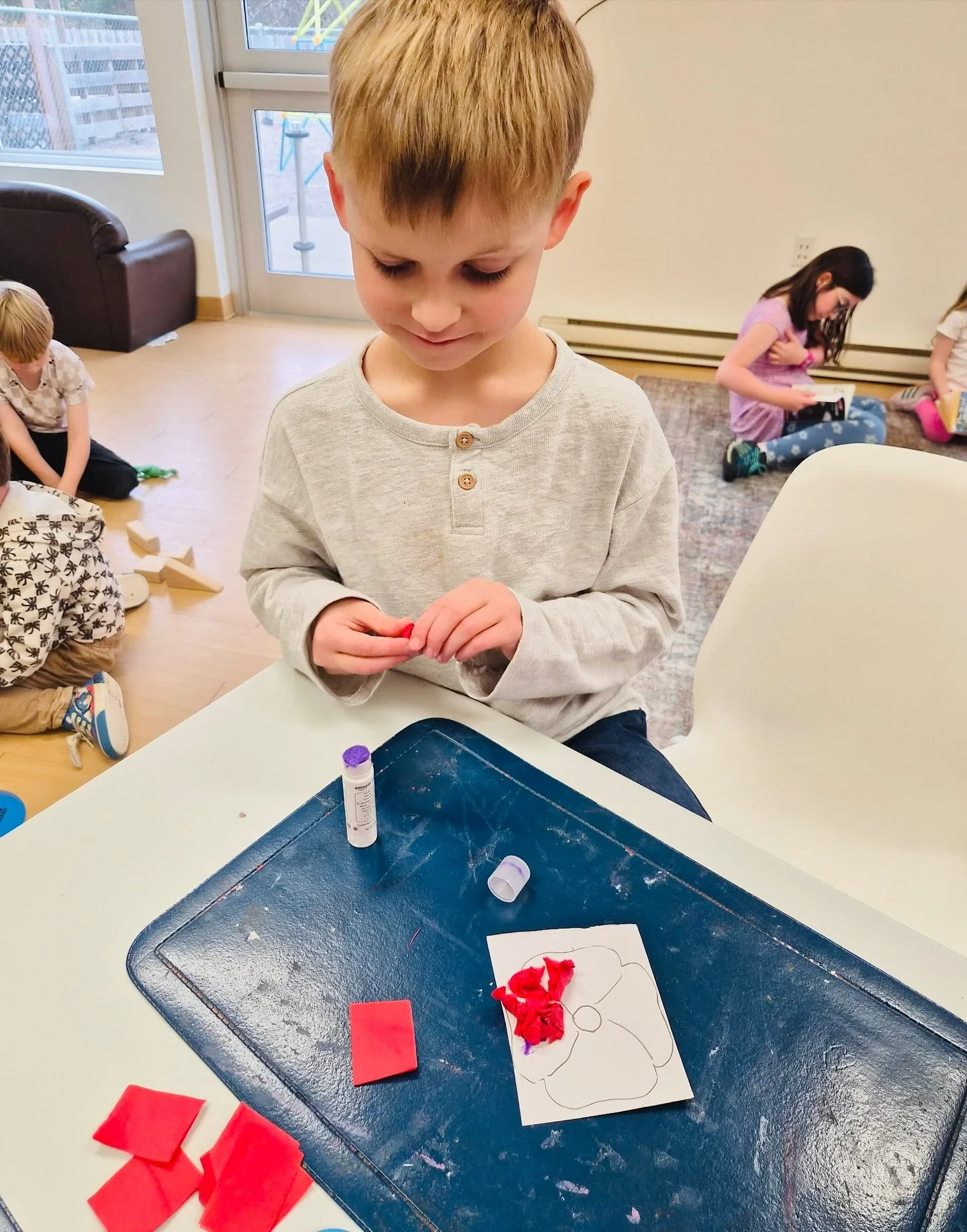 To honour Remembrance Day, our after school program friends engaged in a creative and meaningful art activity by making tissue paper poppies. 

Each child began by drawing or tracing a poppy on card stock, then carefully filled it in with red and bla