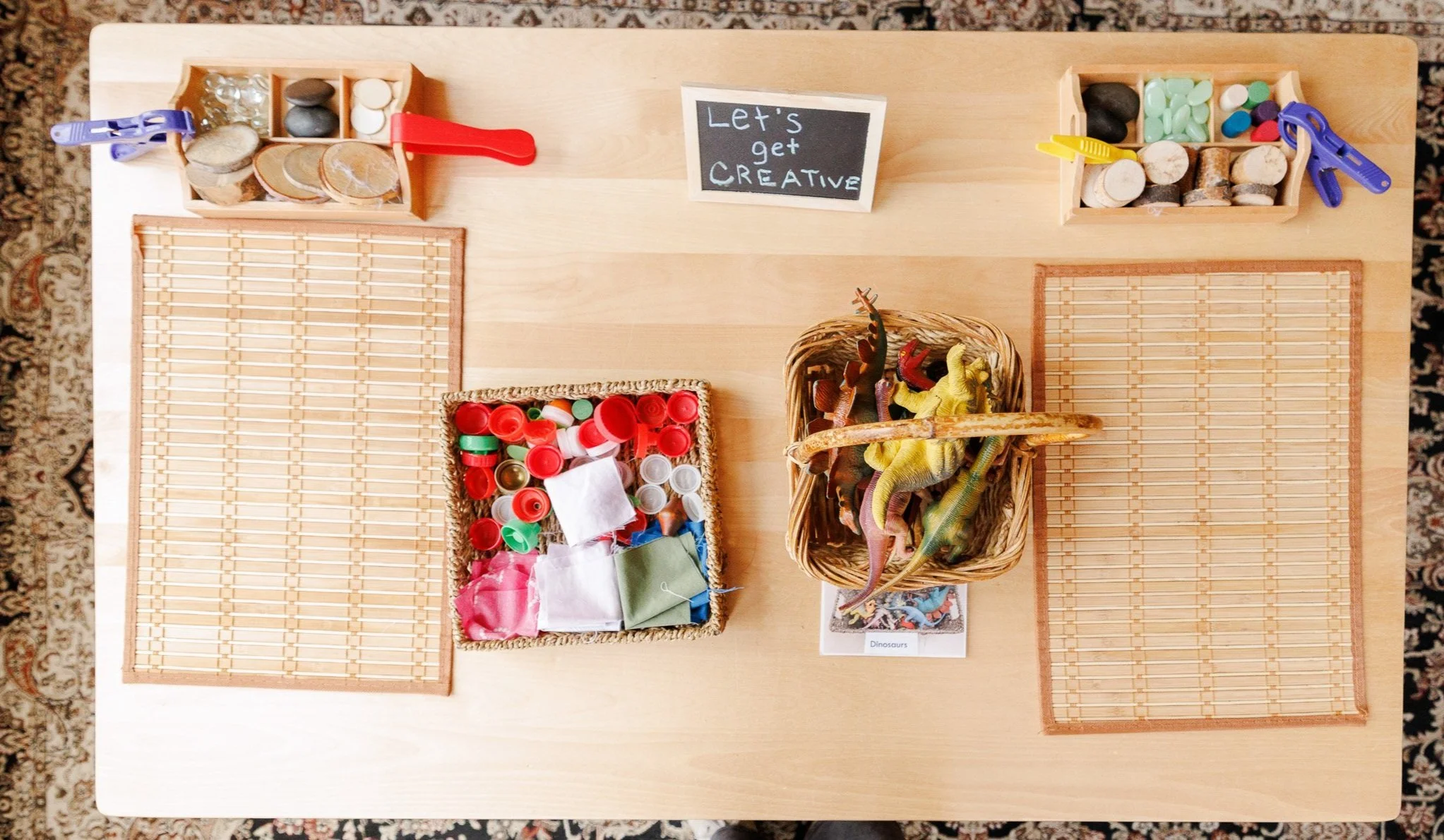 early-achievers-montessori-school-top-view-of-natural-toys-on-table.jpg