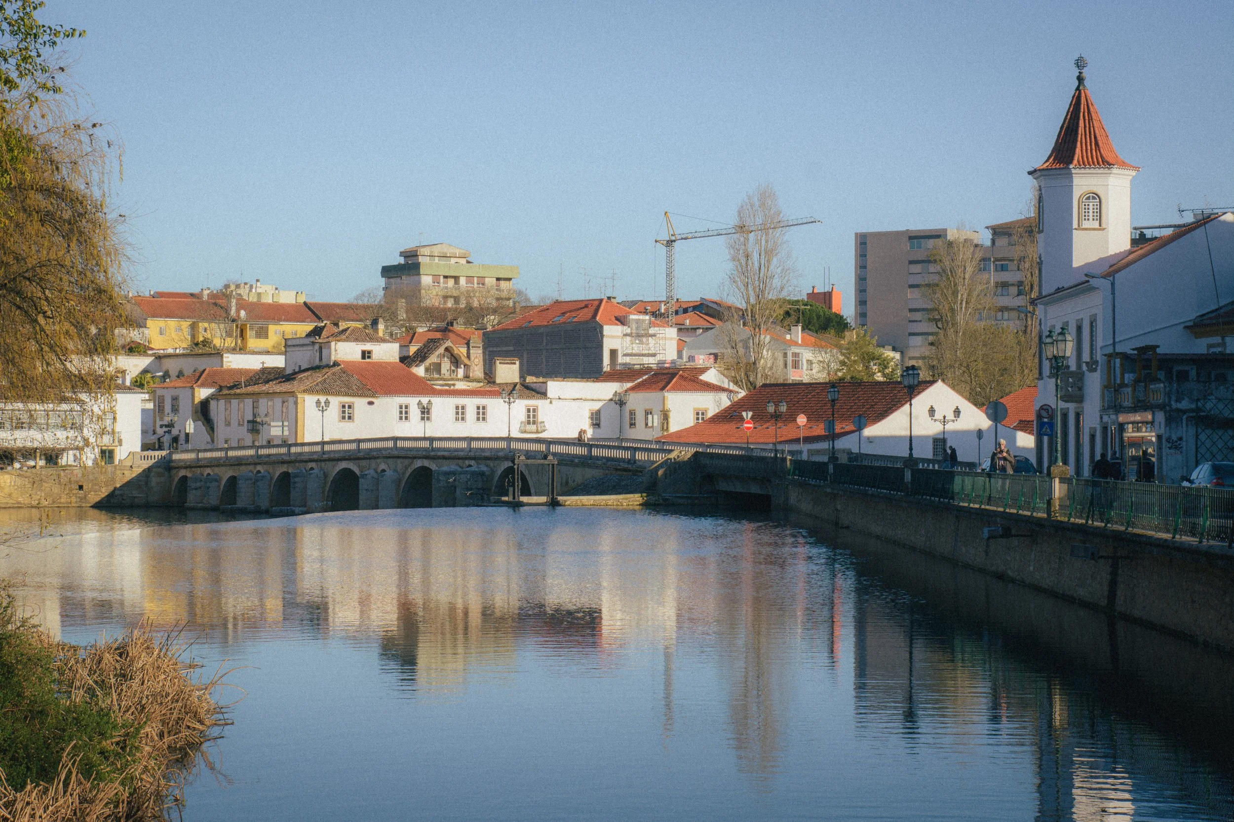 Fine art land scape of the city Coimbra in Portugal and his blue lake and blue sky.