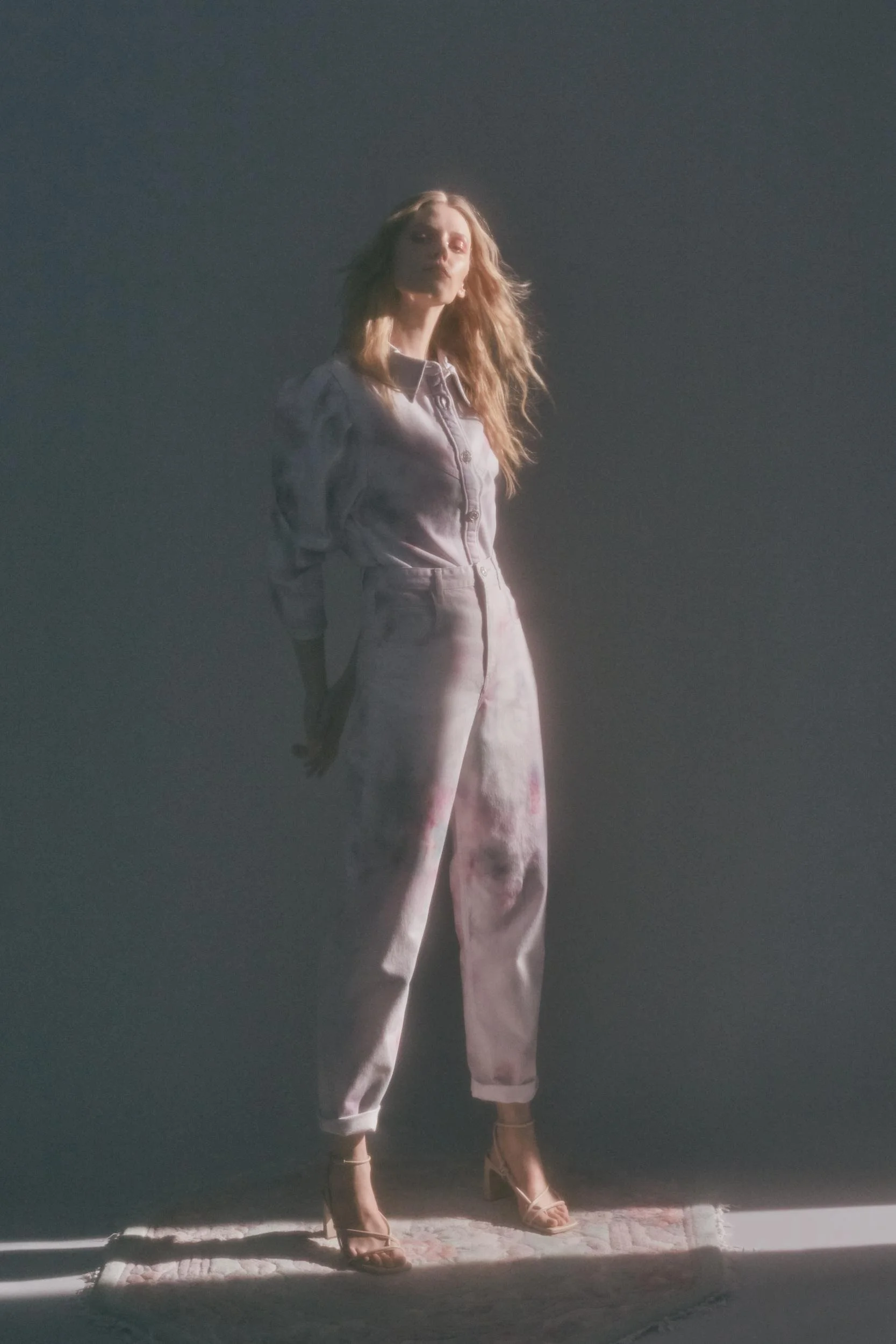 Denim editorial for Latest Magazine: lilac denim jumpsuit in studio light