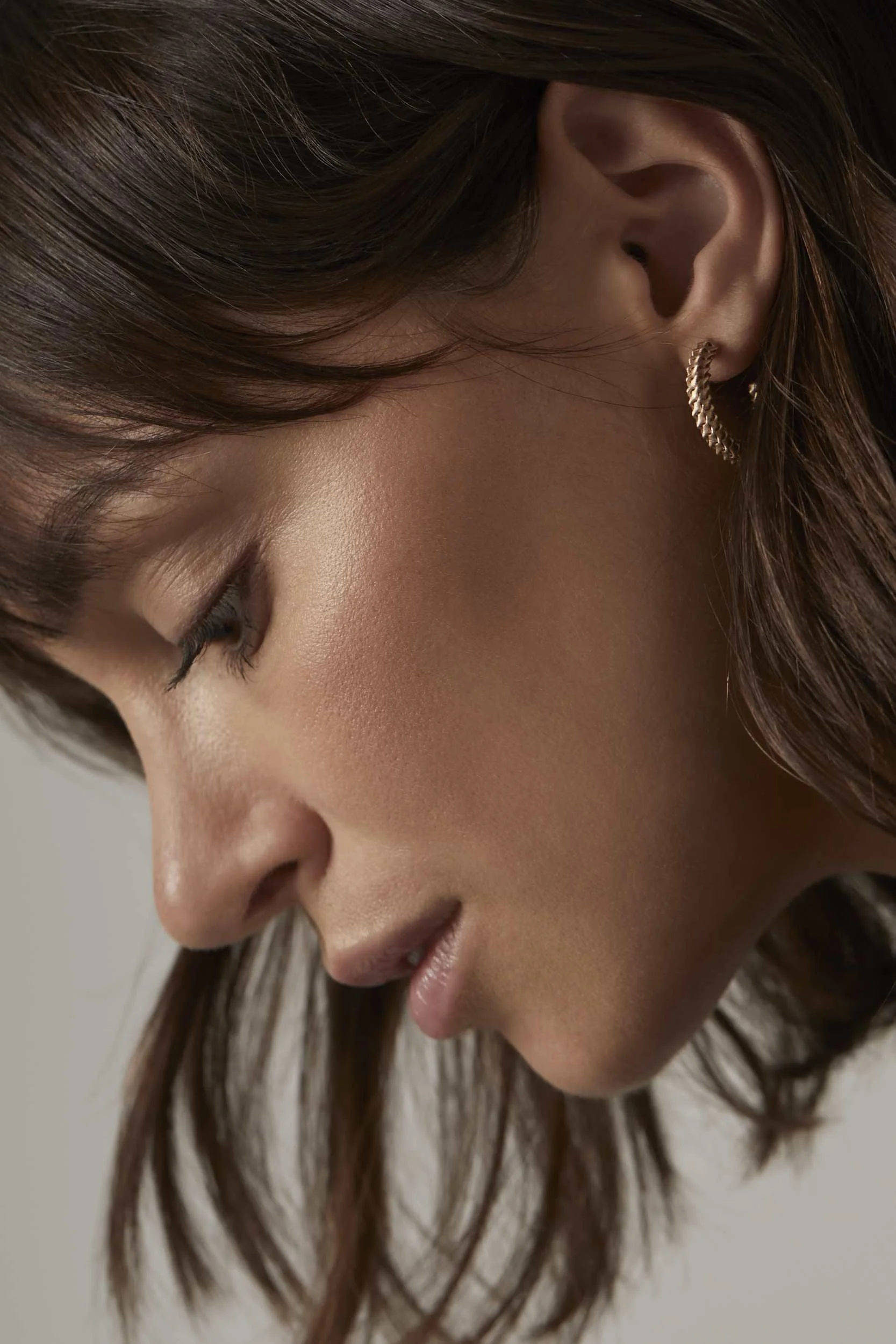 Jewellery campaign for Sian Design: close-up profile with a hoop earring