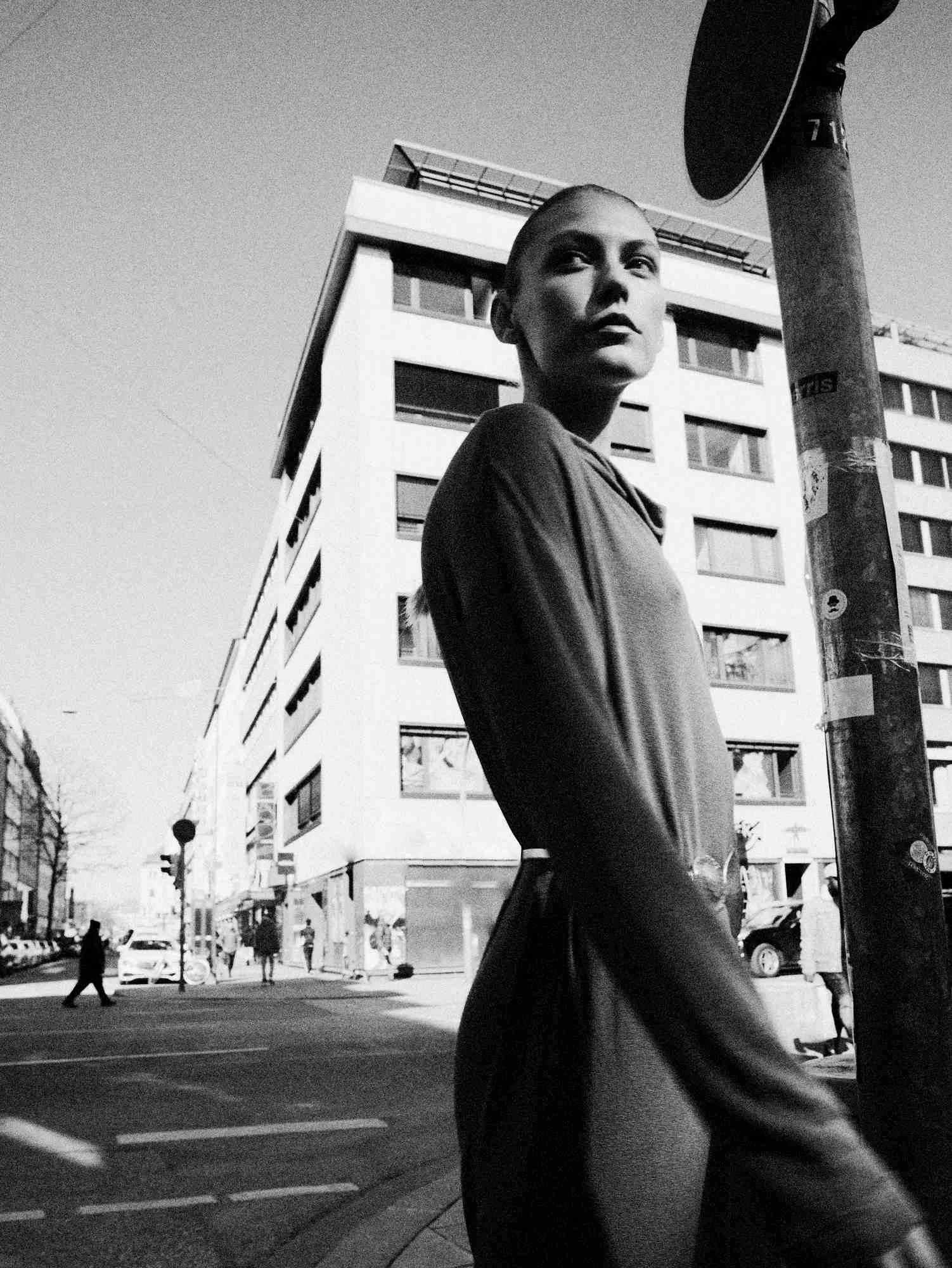 Long dress in front of a city building, black and white