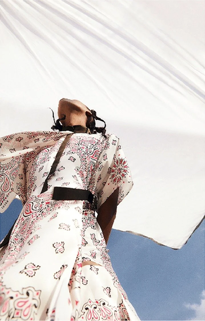 Floral dress with fabric caught in the wind