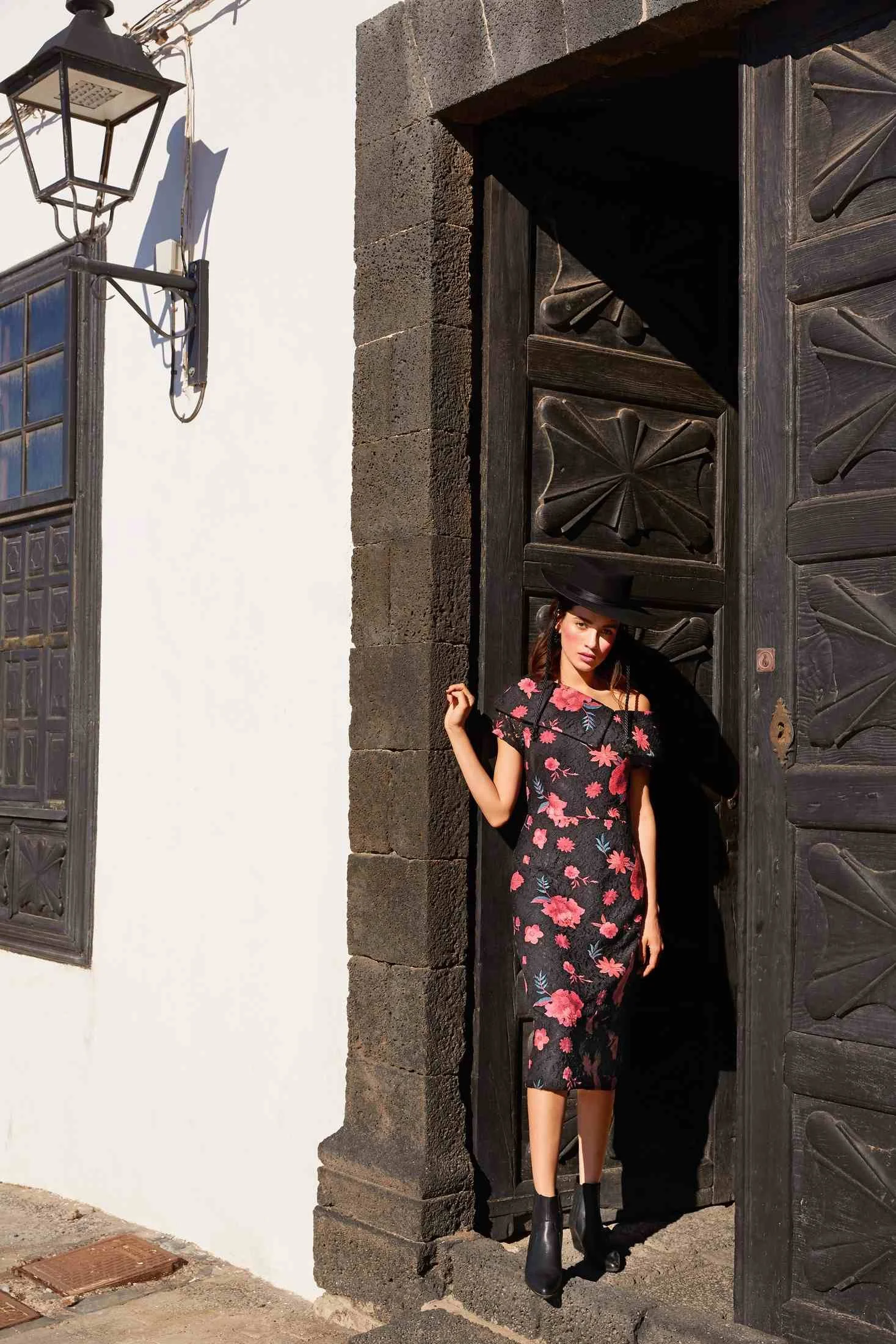 Floral dress in a dark doorway