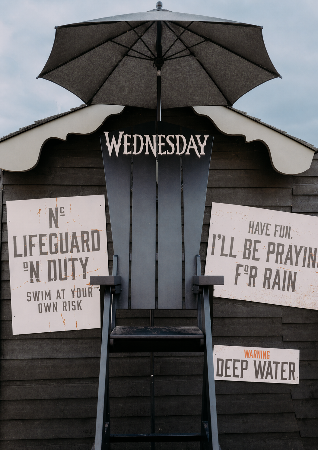 Seaside lifeguard station on a cloudy day.png