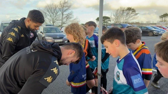 Mount Hawke Academy grab autographs from Truro City Players