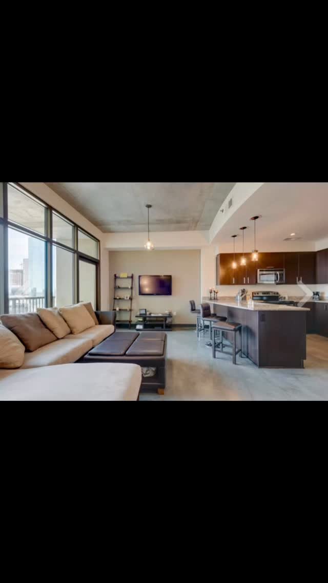 This full downtown condo transformation is one of our favorite recent projects! New floors, custom kitchen cabinets with stunning quartz countertops, and a luxury new shower. Check out the before & after shots of this stunning renovation in Midto