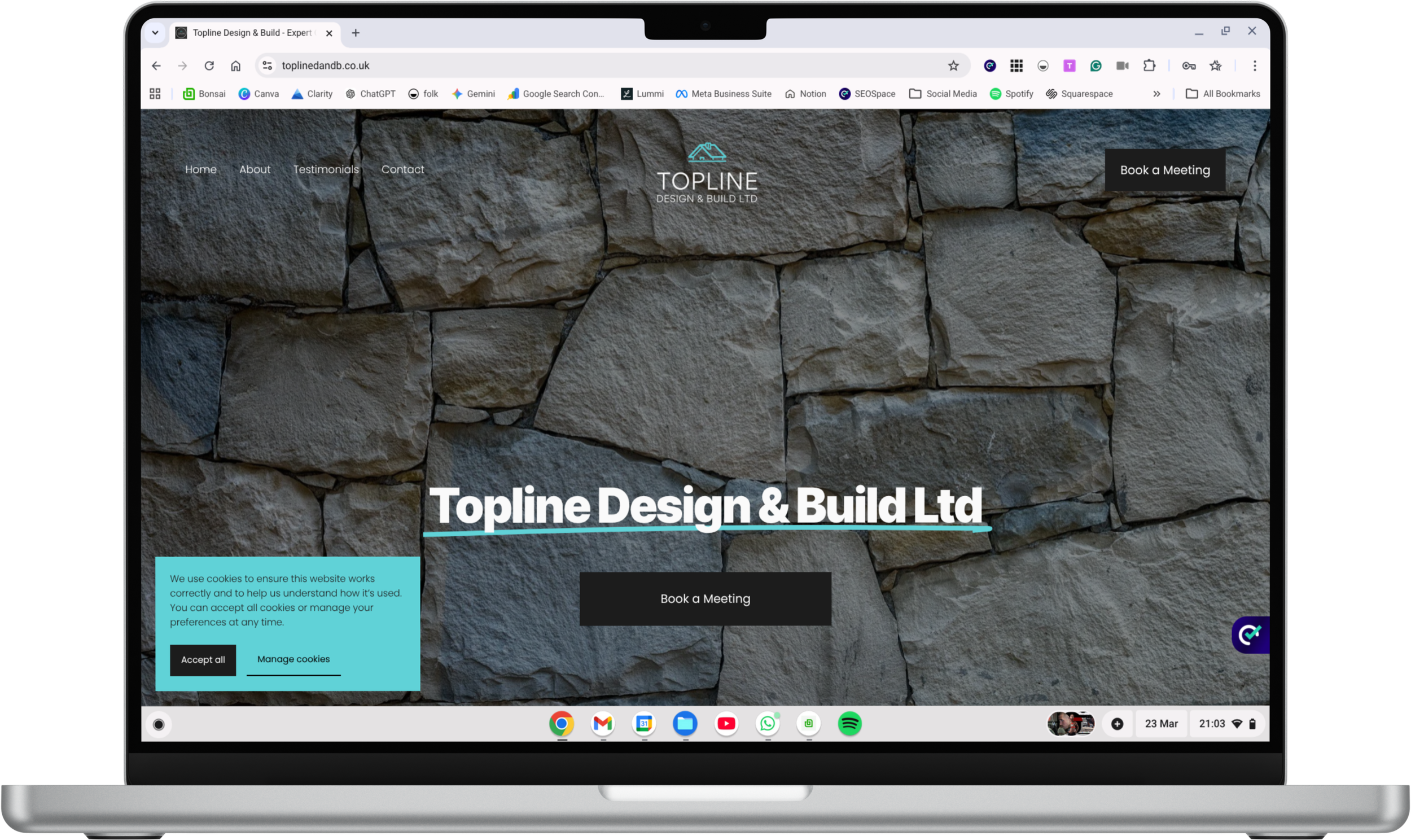 Website homepage for Topline Design & Build Ltd, featuring a stone wall background with navigation menu, company logo, and a 'Book a Meeting' button.