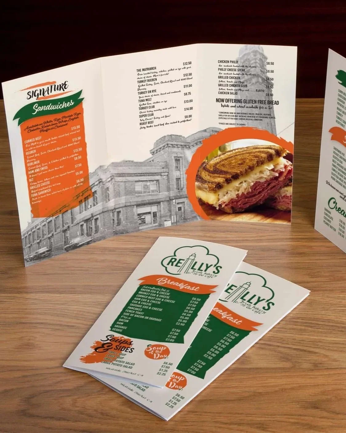 Menus from a restaurant called Relly's, featuring options for sandwiches and breakfast, with prices listed for each item.