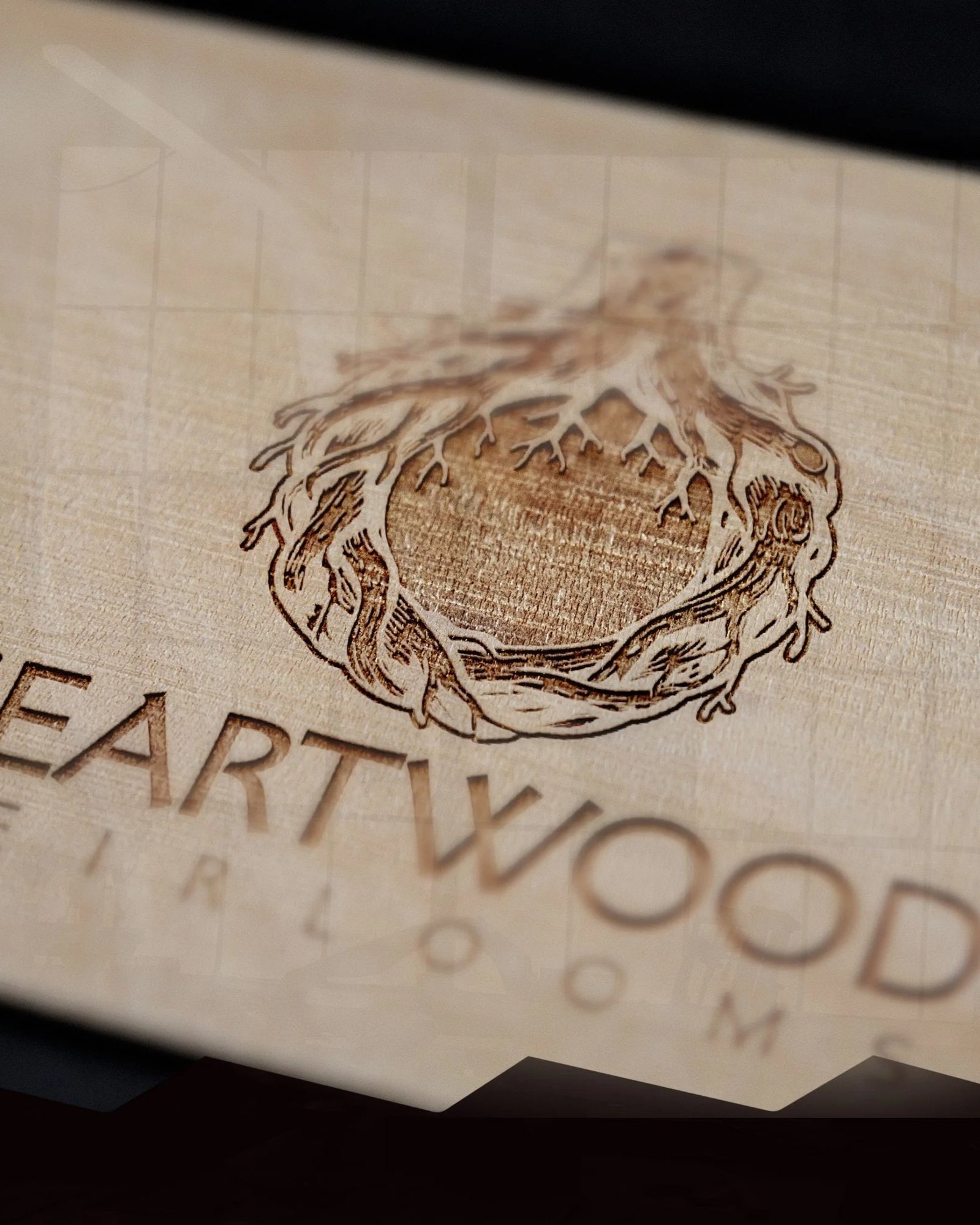 Logo with roots entangled forming a ring