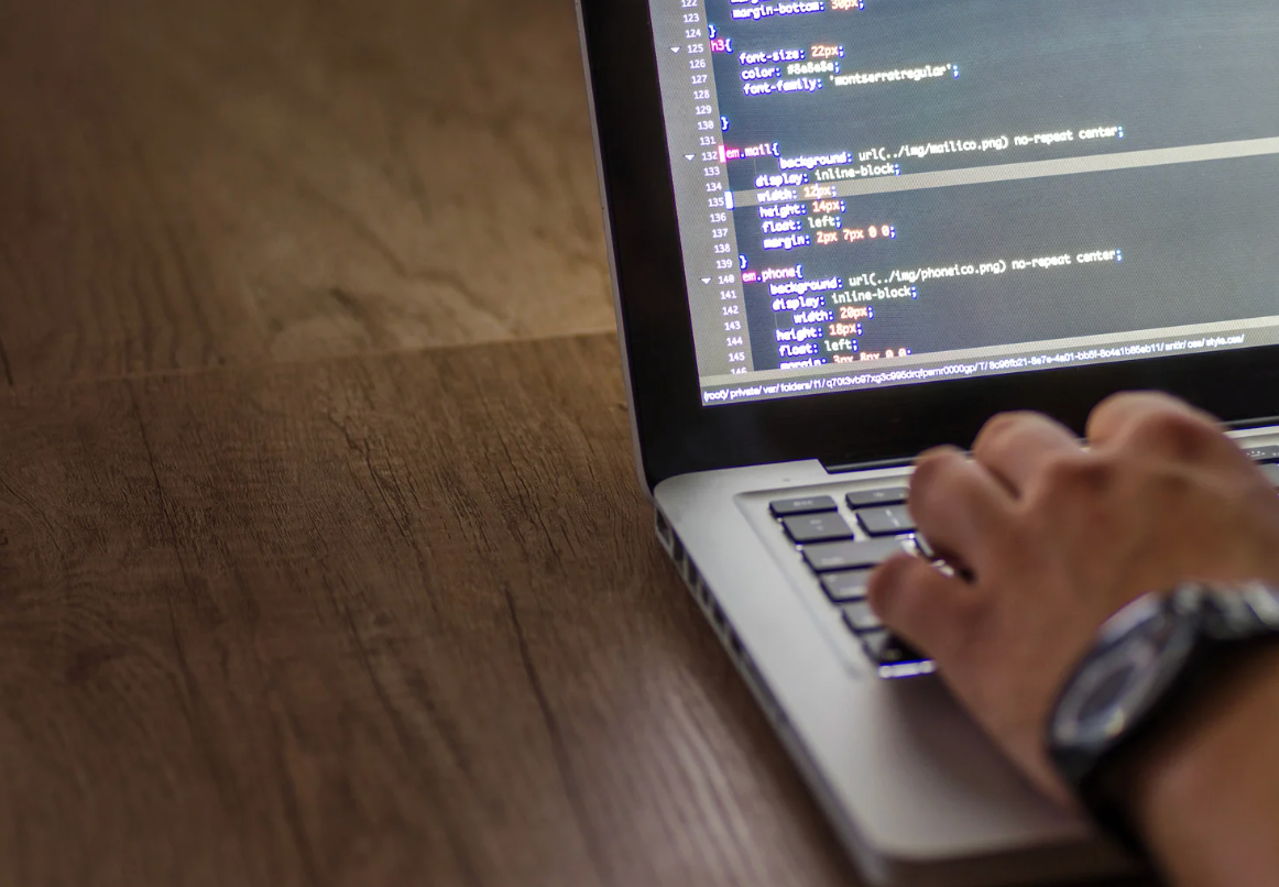 Closeup of a laptop screen with code on it