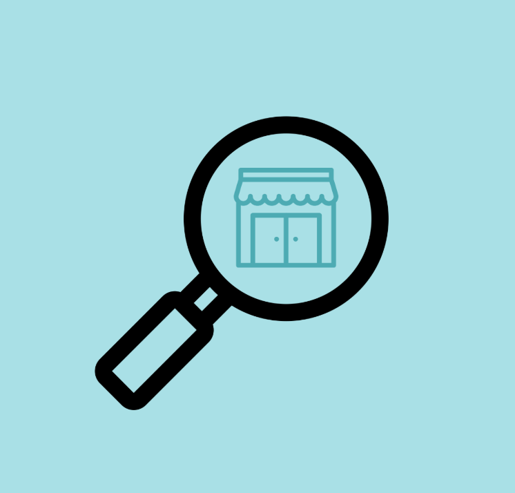 Magnifying glass with a store front in the center