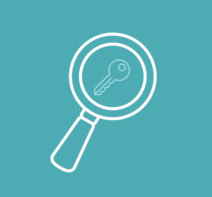 Key inside a magnifying glass