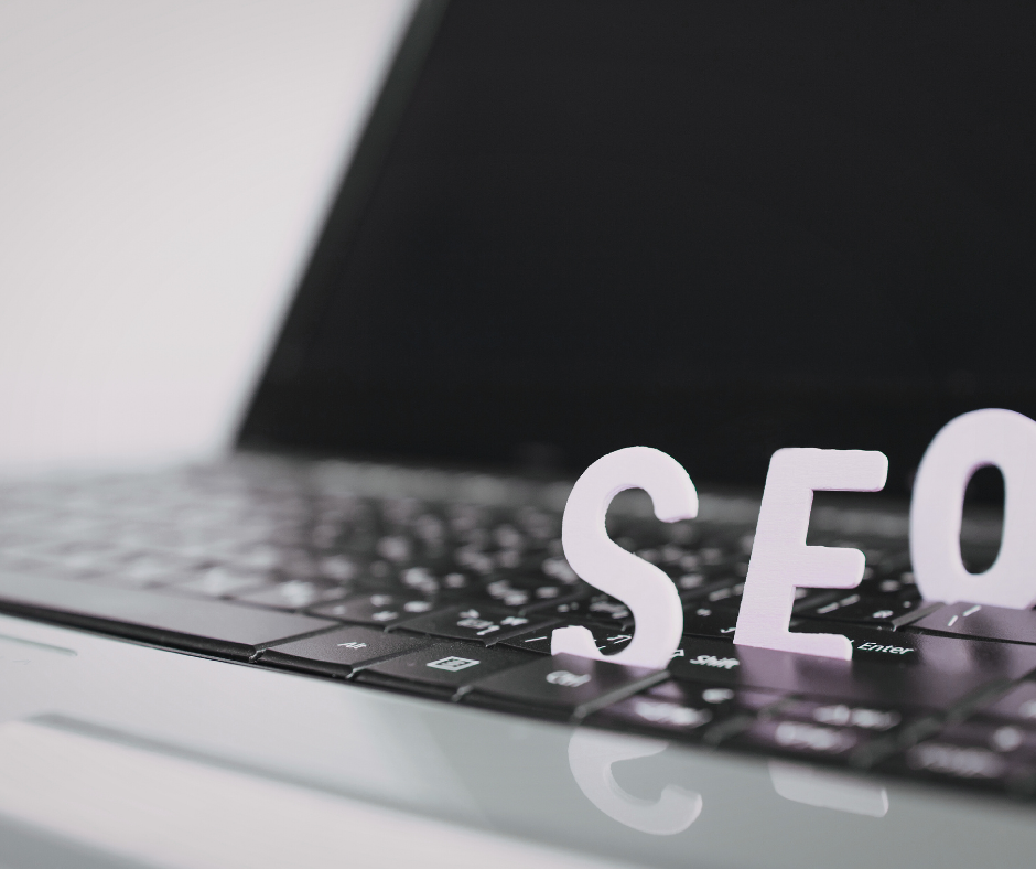 a laptop with "SEO" on it to suggest important of search engine optimization