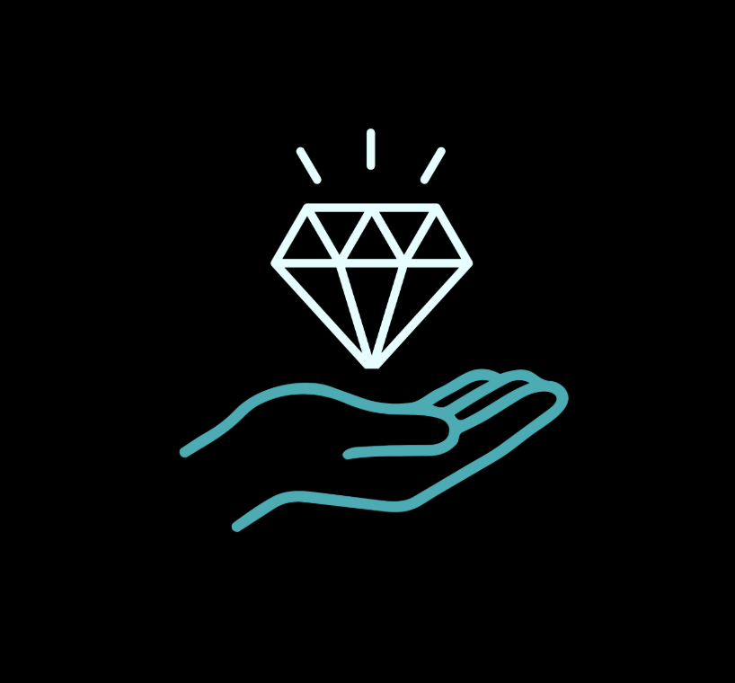 A hand holding a diamond