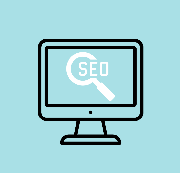 Computer screen with a magnifying glass and SEO