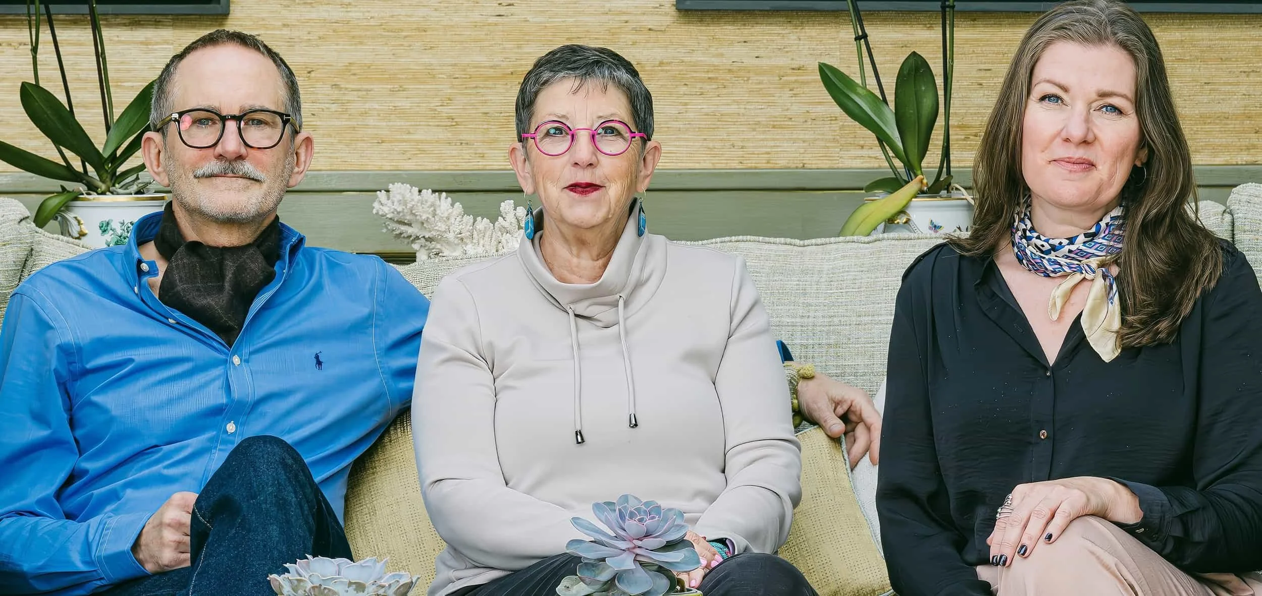 Photo of Colin, Carol, Christal sitting on a couch