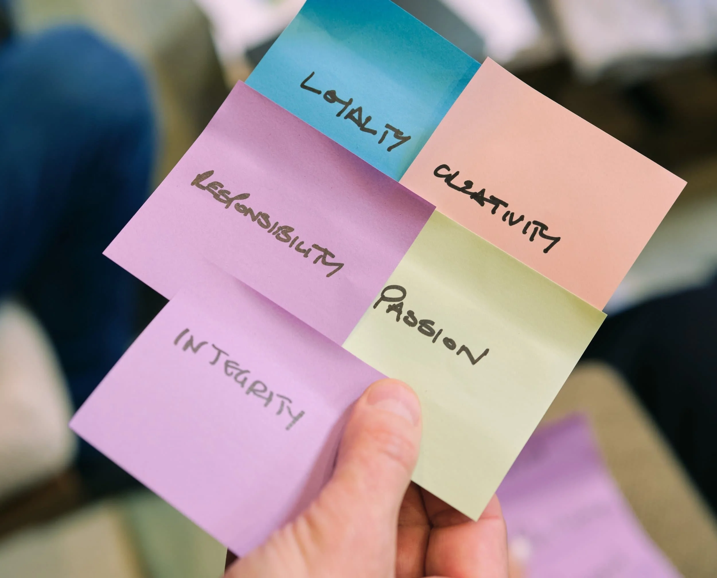 Sticky notes in hand