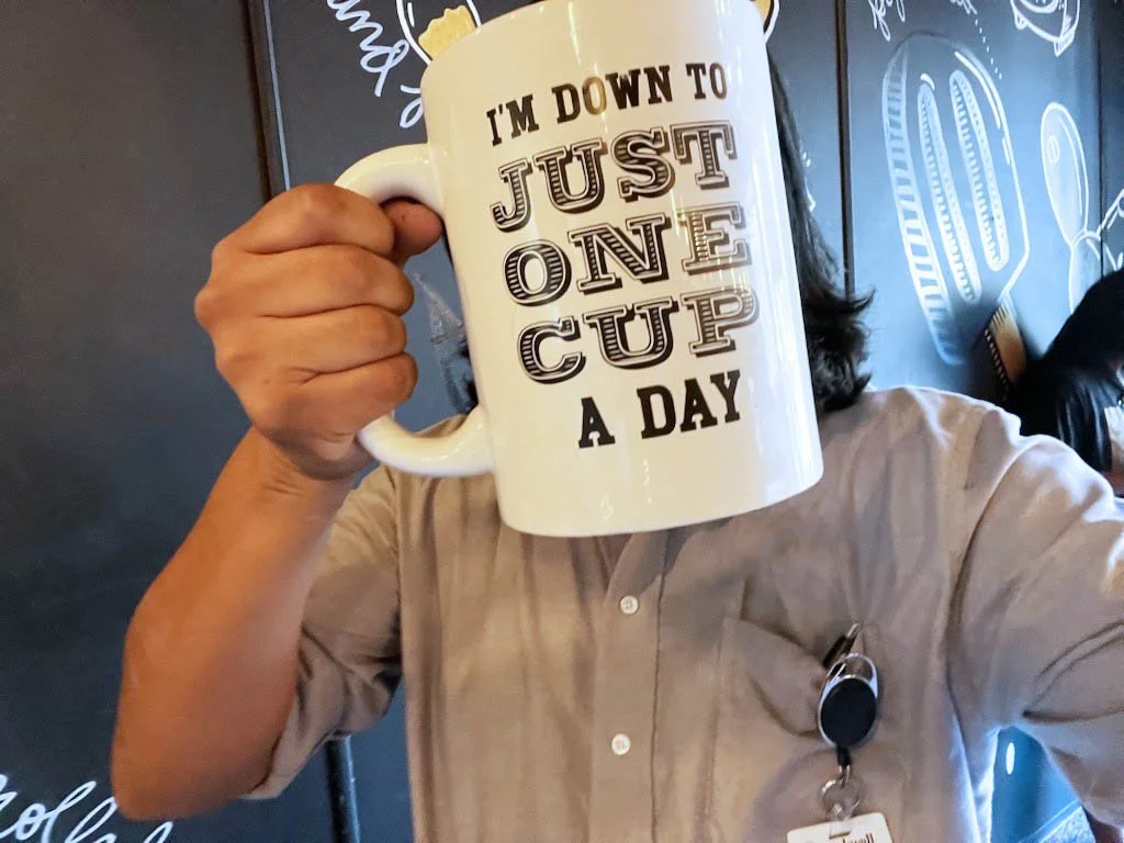 Pedro holding giant mug photo