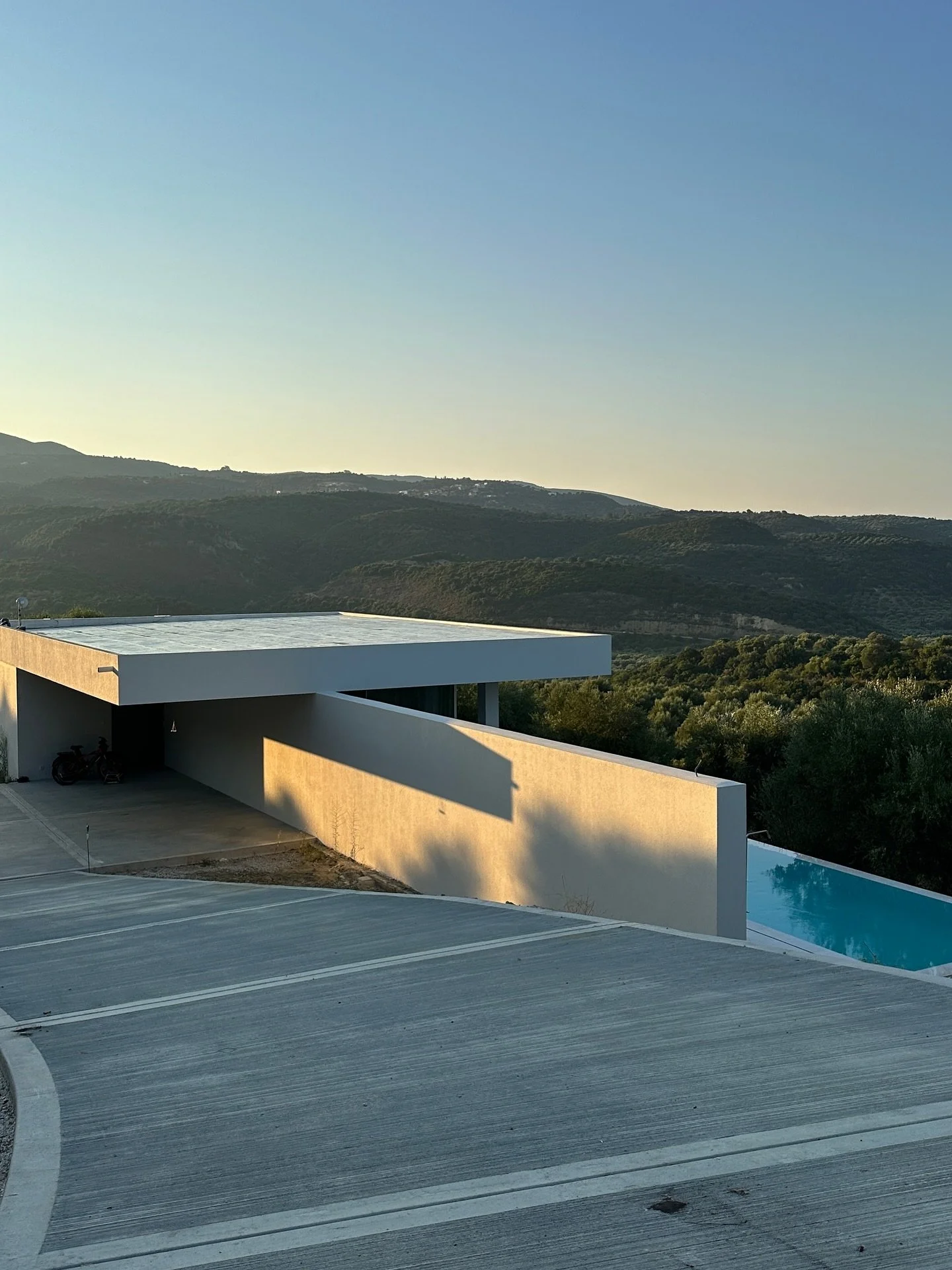 Our favorite balance: Morning rays, simple architectural lines in a soft lush environment.