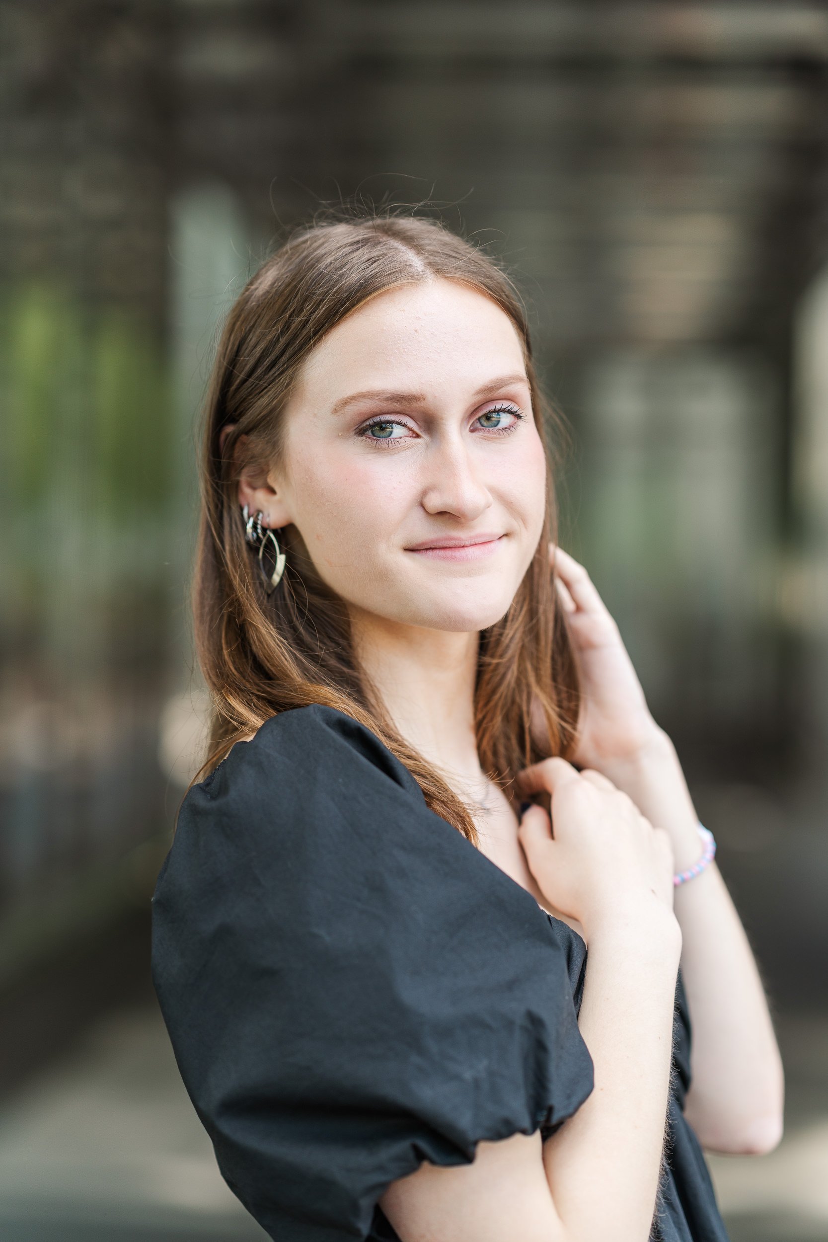 girl with black dress poses.jpg