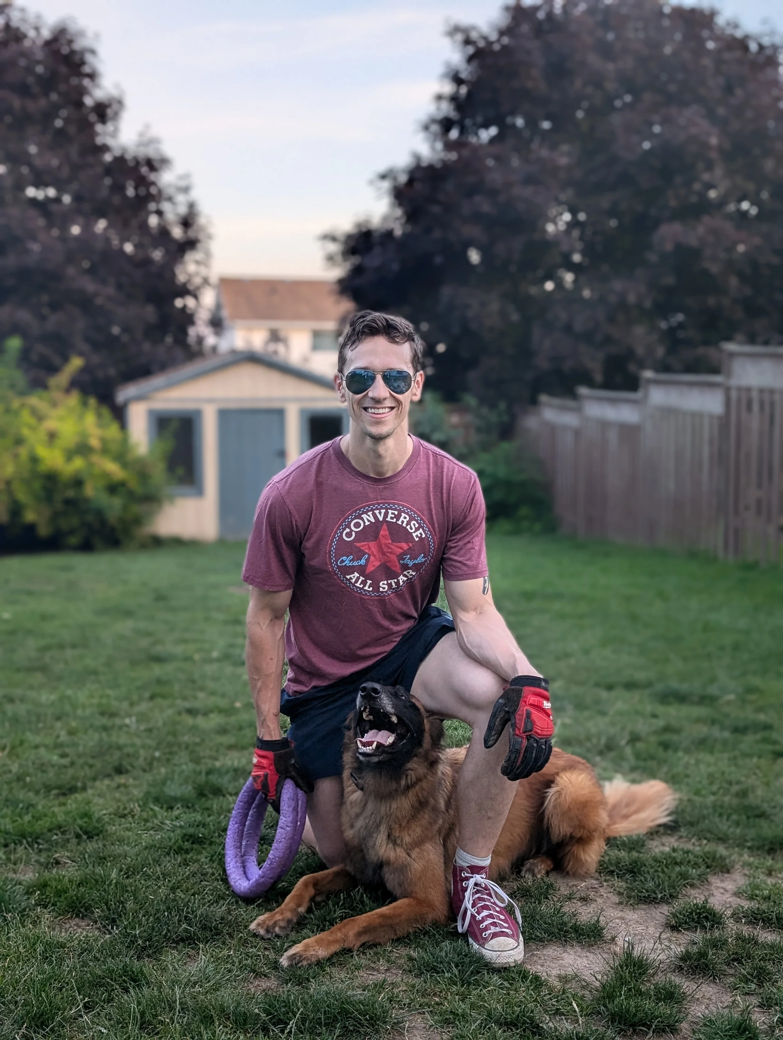 Dog trainer with happy malinois