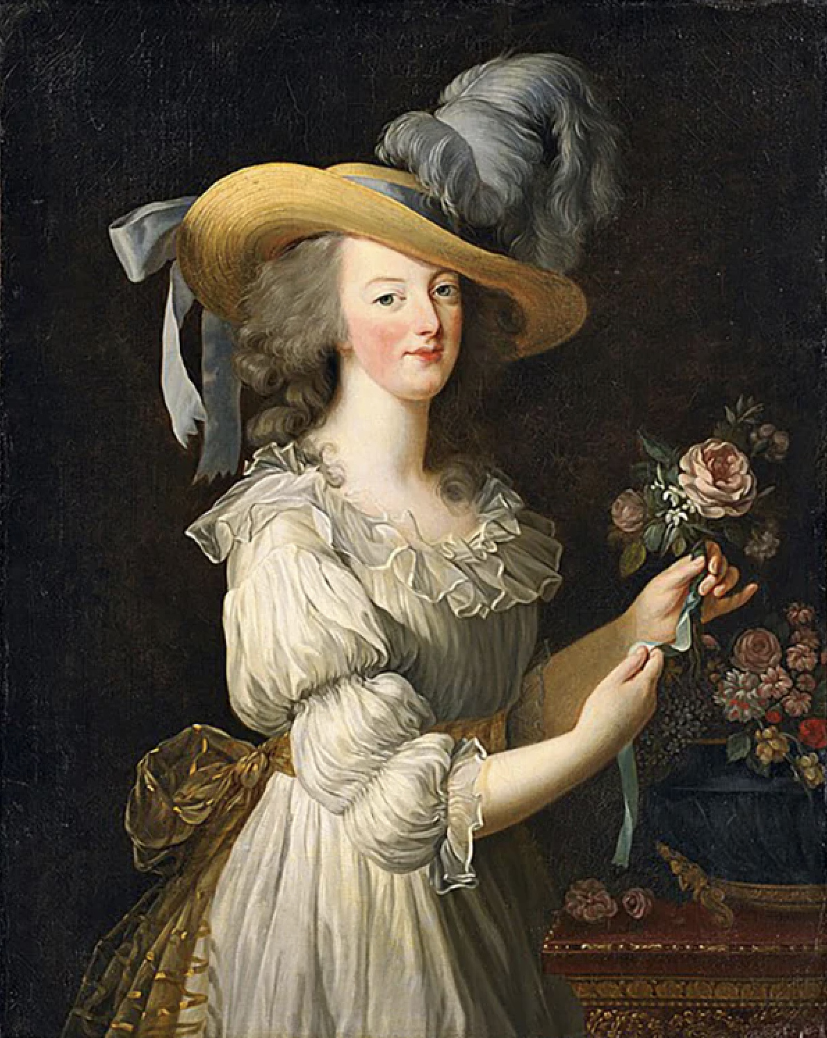 A portrait of a woman in 18th-century attire with curly hair, wearing a wide-brimmed straw hat with a ribbon and a feather, holding a bouquet of flowers, with a dark background.