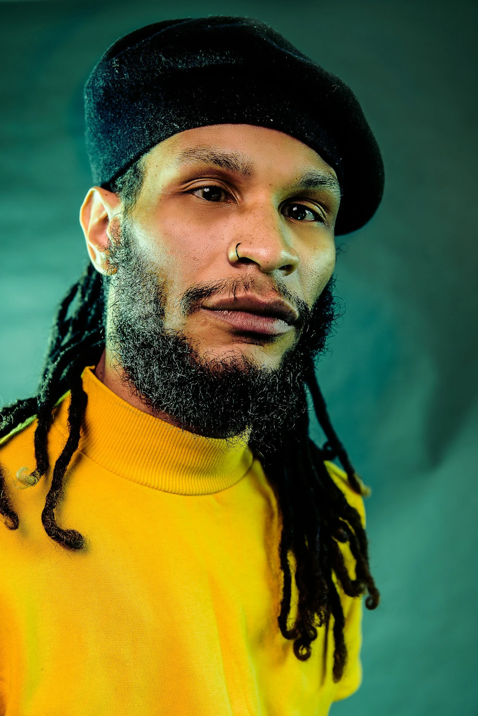 A man with dreadlocks in a rental suite for locticians in Brooklyn Center